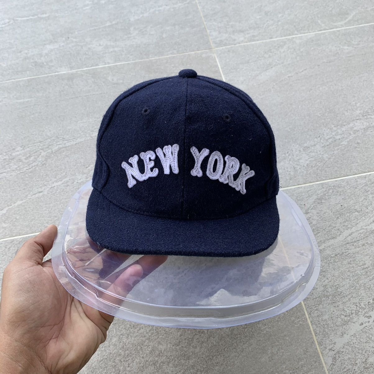 BLUE cap spell out new york logo.. wool material..