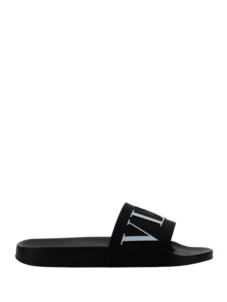 o1b1tn1i0523 Slip Ons in Black