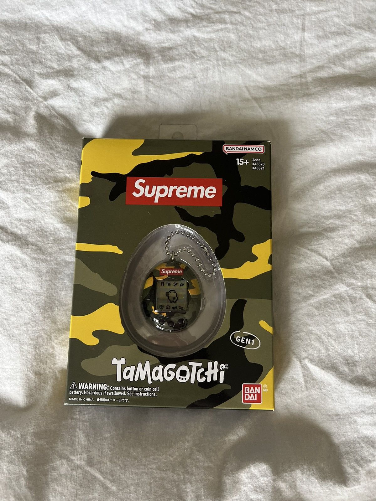 Supreme® Tamagotchi Yellow Supreme Bandai Namco Tamagotchi Yellow - SS23 - Brand New W