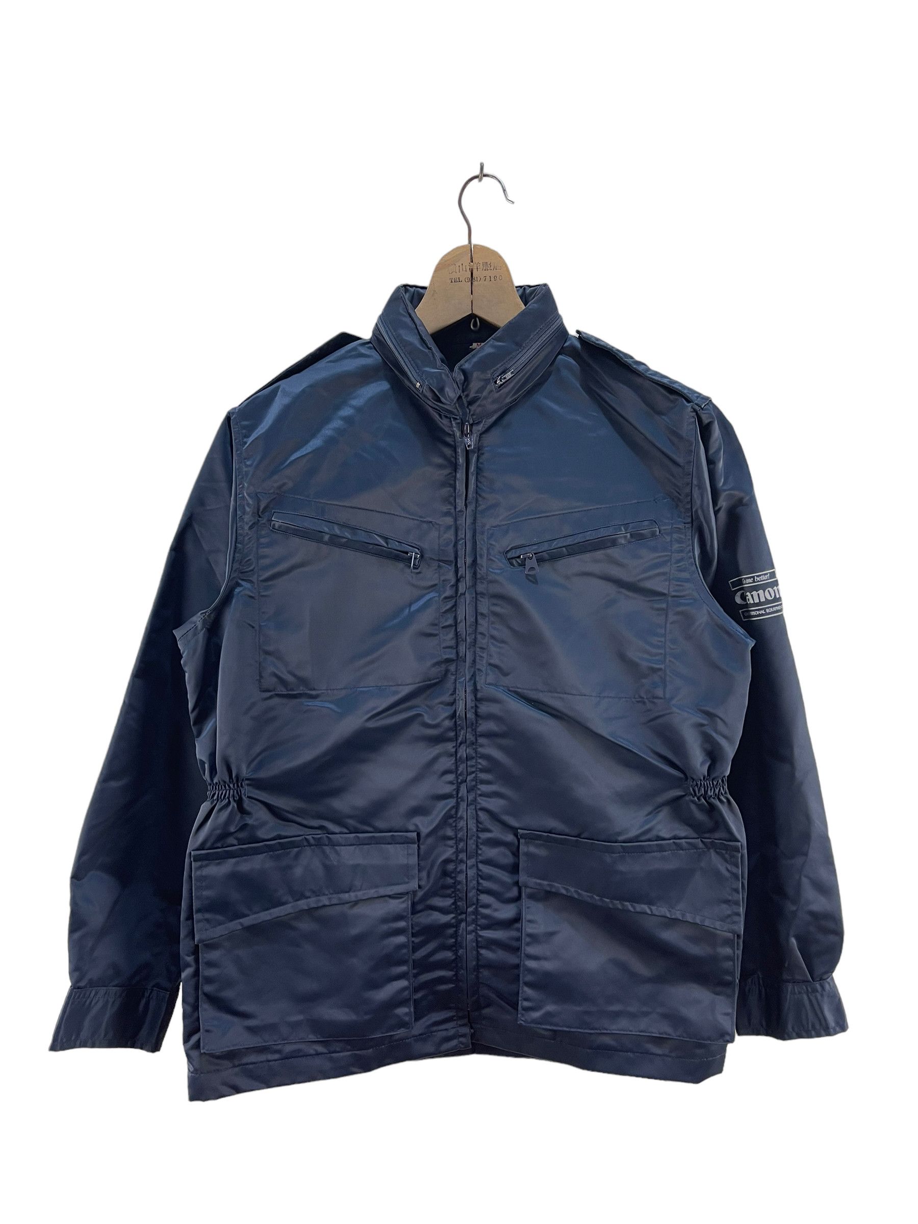 image of Vintage Canon Personal Equipment Jacket in Blue, Men's (Size Medium)