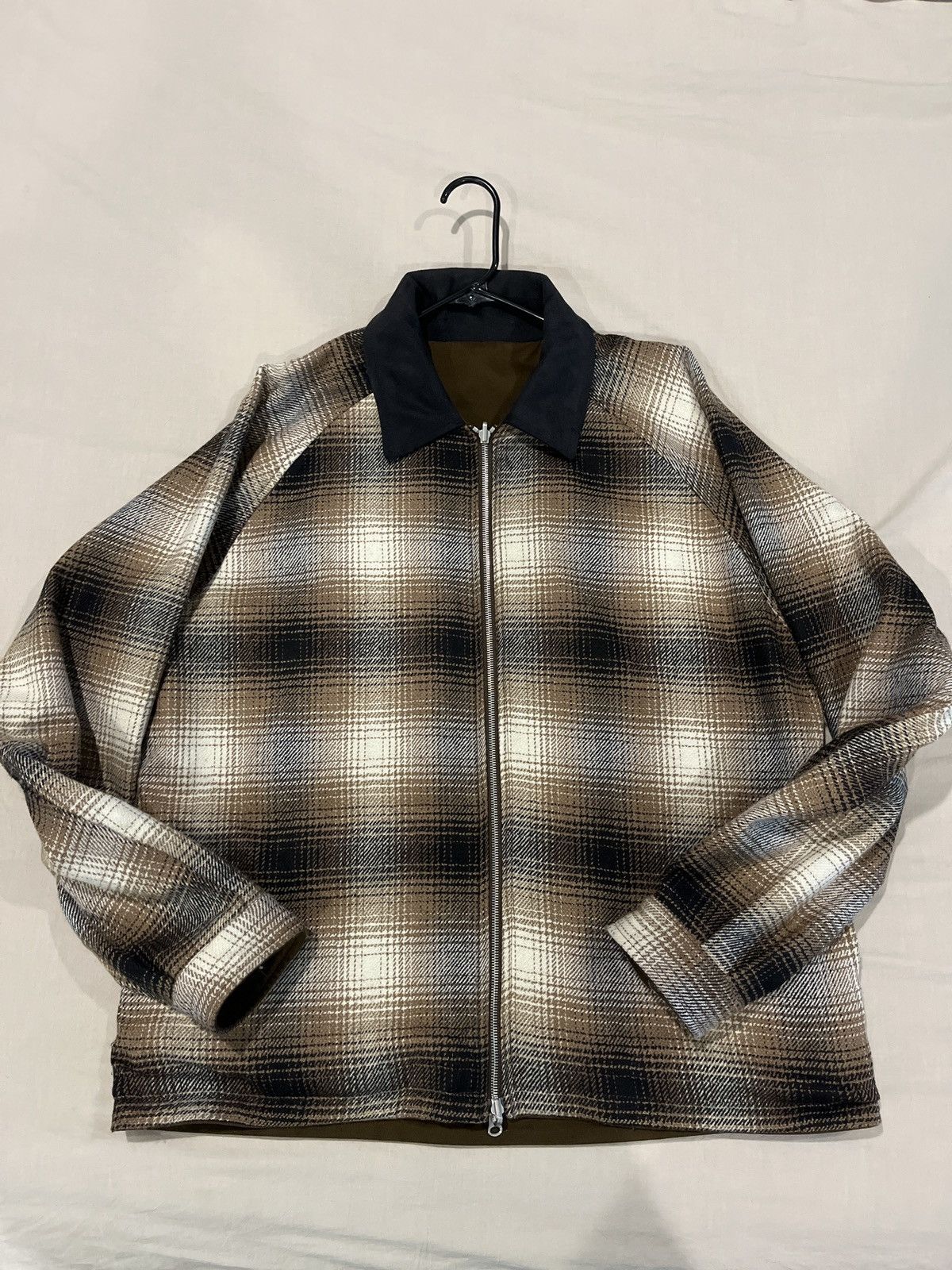 Represent reversible zip up flannel jacket