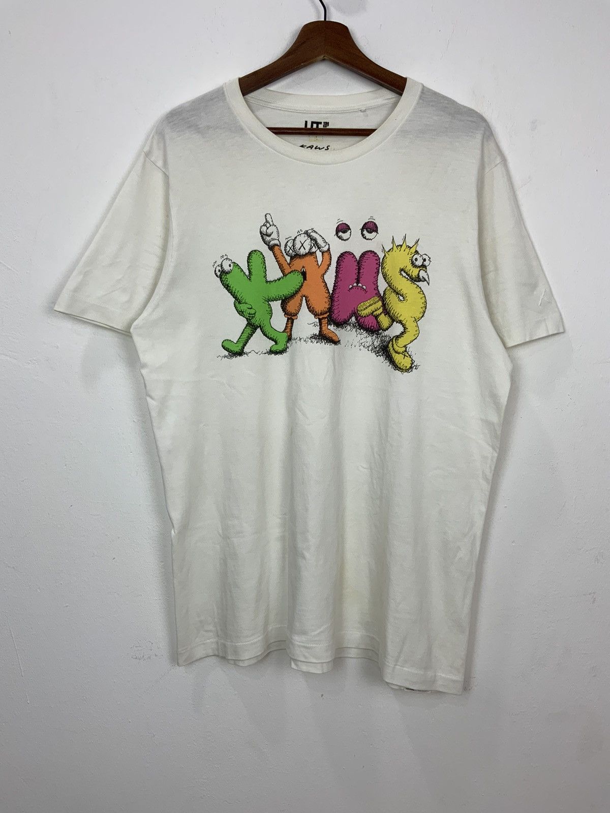 image of Ut Kaws Streetwear Single Stitch Avant Garde Tee in White, Men's (Size Large)