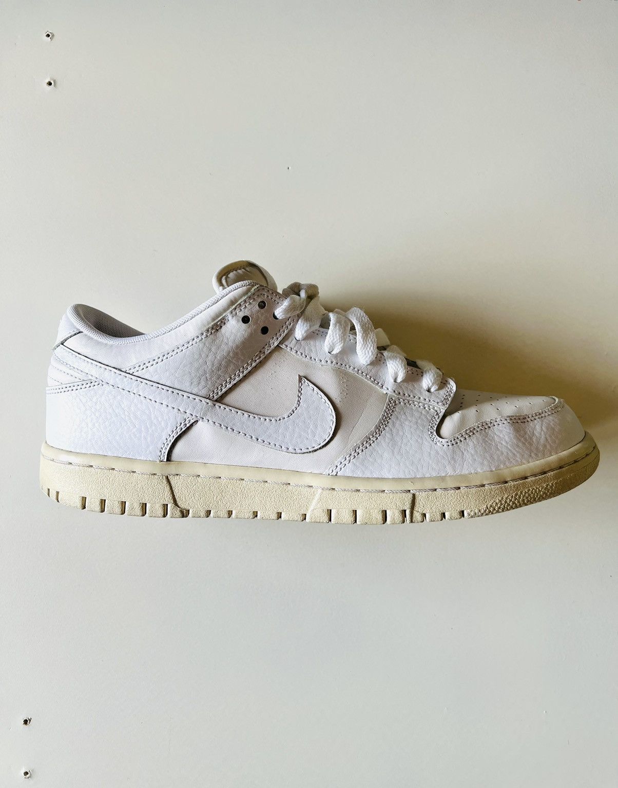 Nike Nike Dunk Low Triple White Size US 10 / EU 43 - 1 Thumbnail