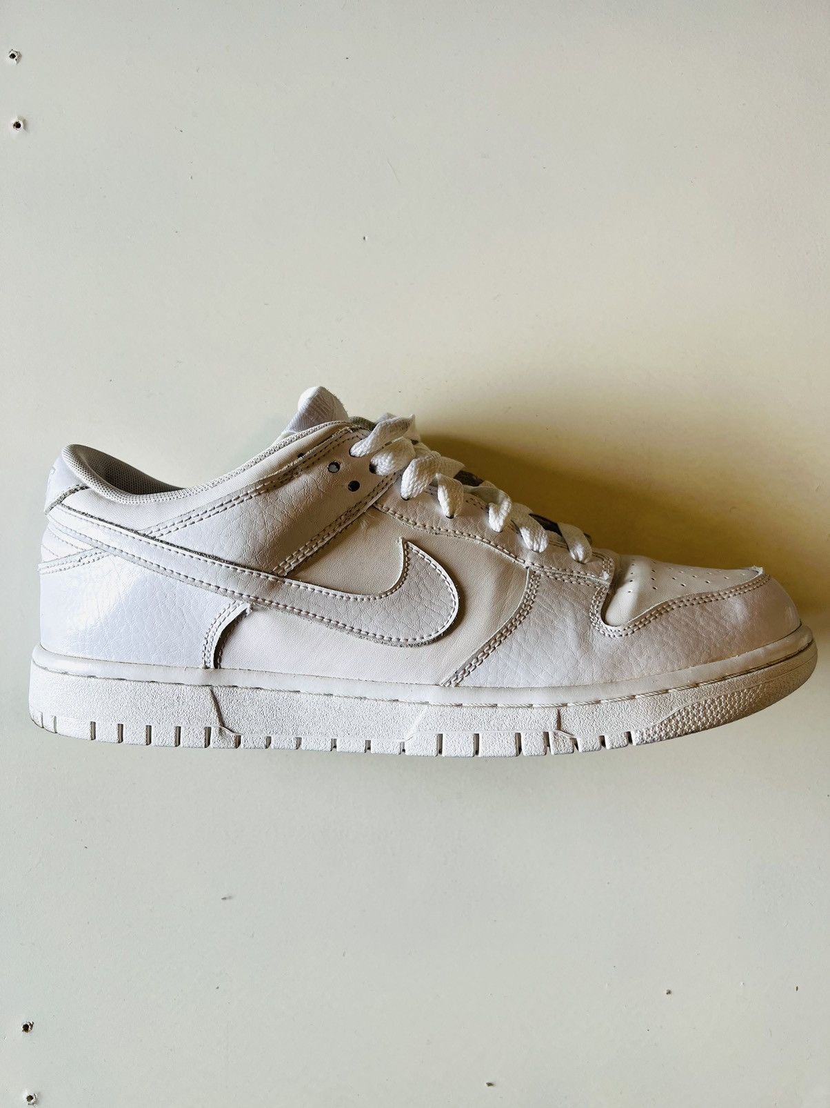 Nike Nike Dunk Low Triple White Size US 10 / EU 43 - 1 Thumbnail