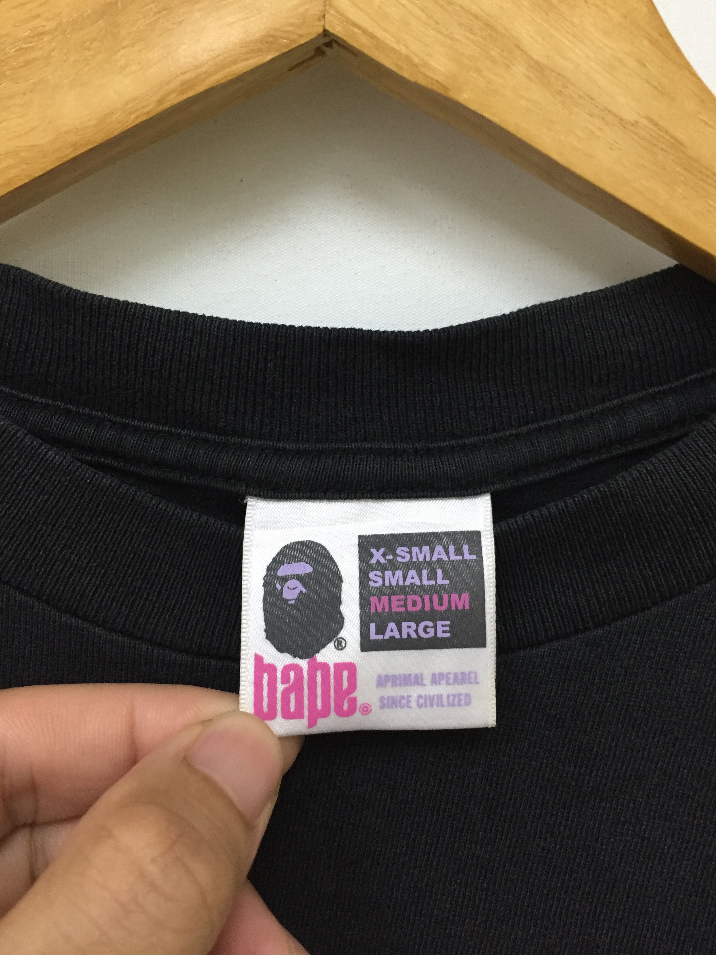 Bape 2005 " Aprimal Apearel" tag Bape Head Big Logo Size US M / EU 48-50 / 2 - 6 Thumbnail