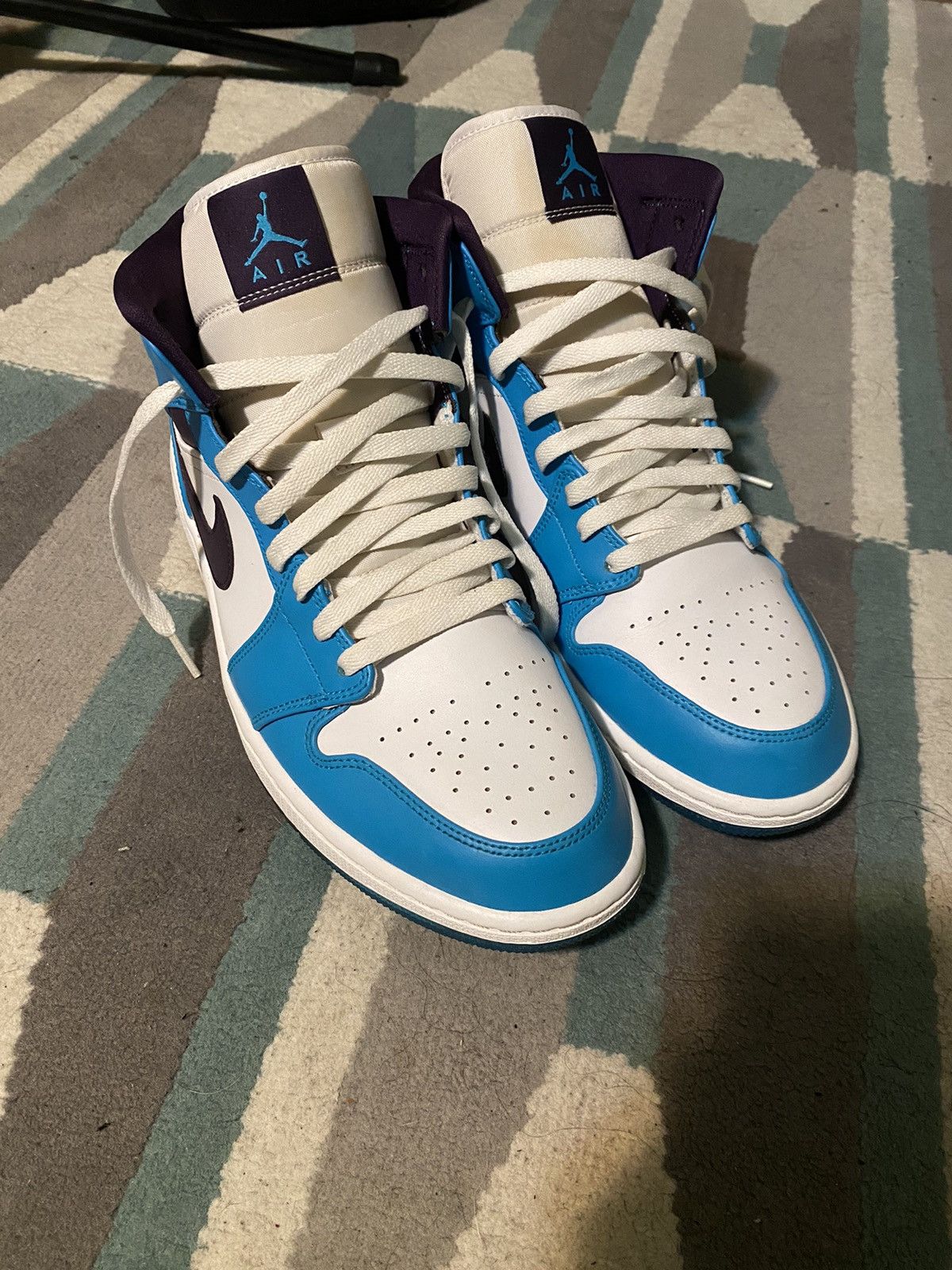 image of Jordan Nike Air Jordan 1 Mid Hornets Shoes in Blue Lagoon/Grand Purple/White, Men's (Size 11)