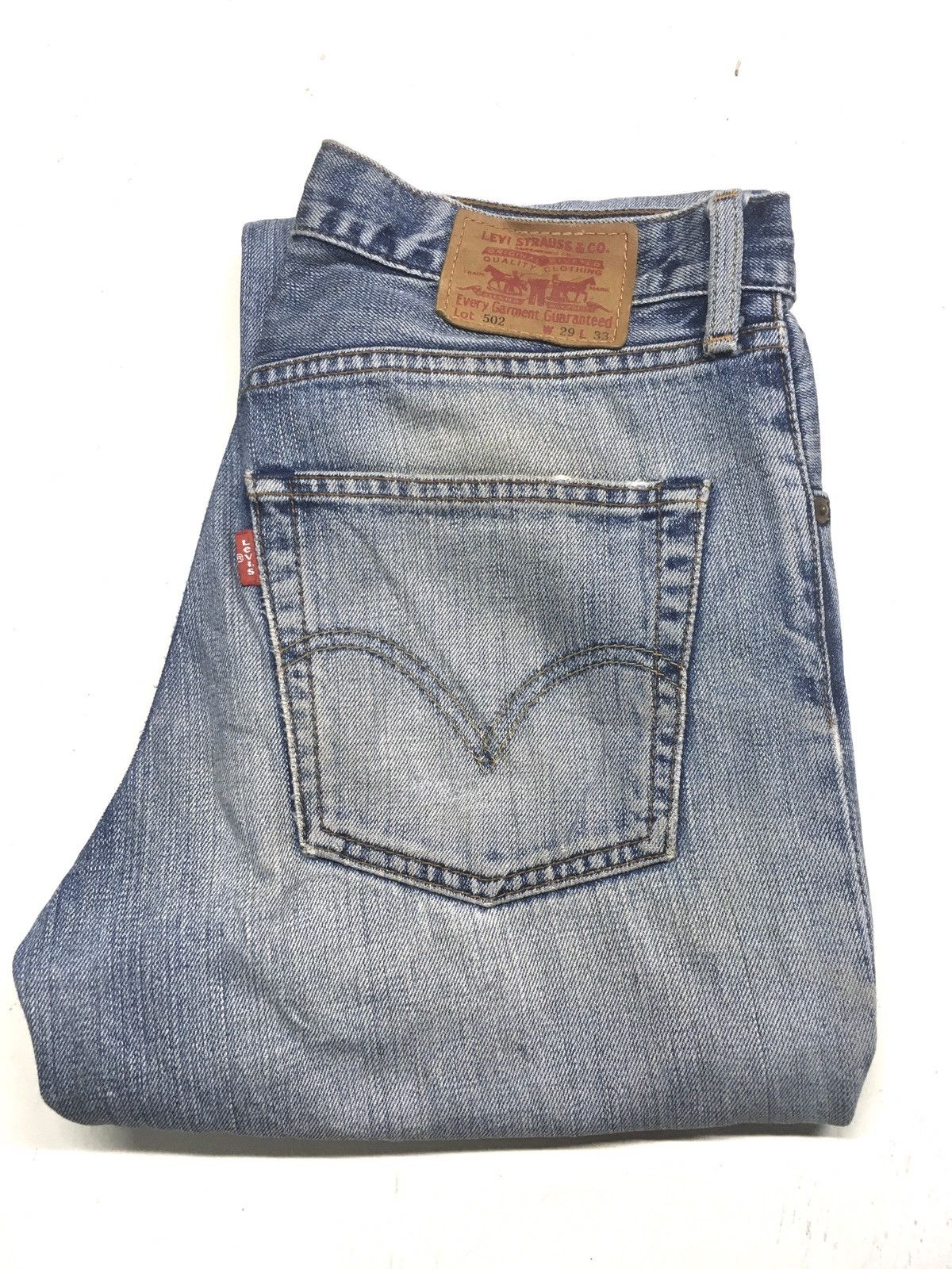 Vintage Levi's 502 blue wash distressed denim japan