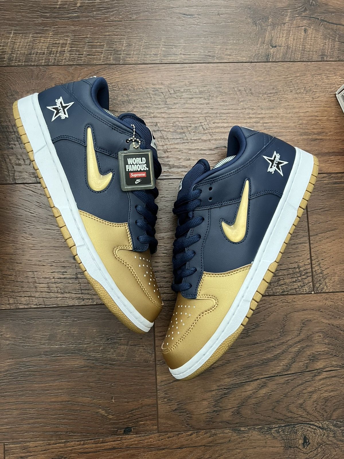 sb dunk low supreme jewel swoosh silver