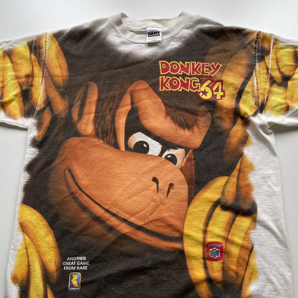 Nintendo × Vintage Vintage 90s Donkey Kong 64 AOP t shirt rare graphic Size US XL / EU 56 / 4 - 2 Thumbnail
