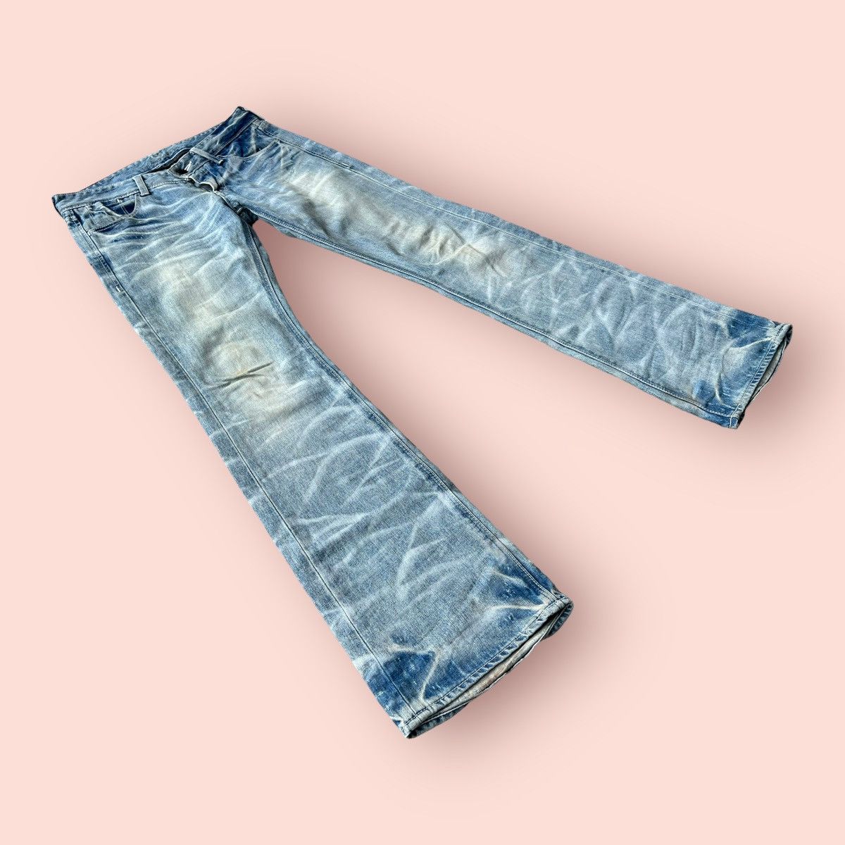 image of Distressed Denim x If Six Was Nine Vintage Murder License Low Rise Flared Denim in White Faded Blue