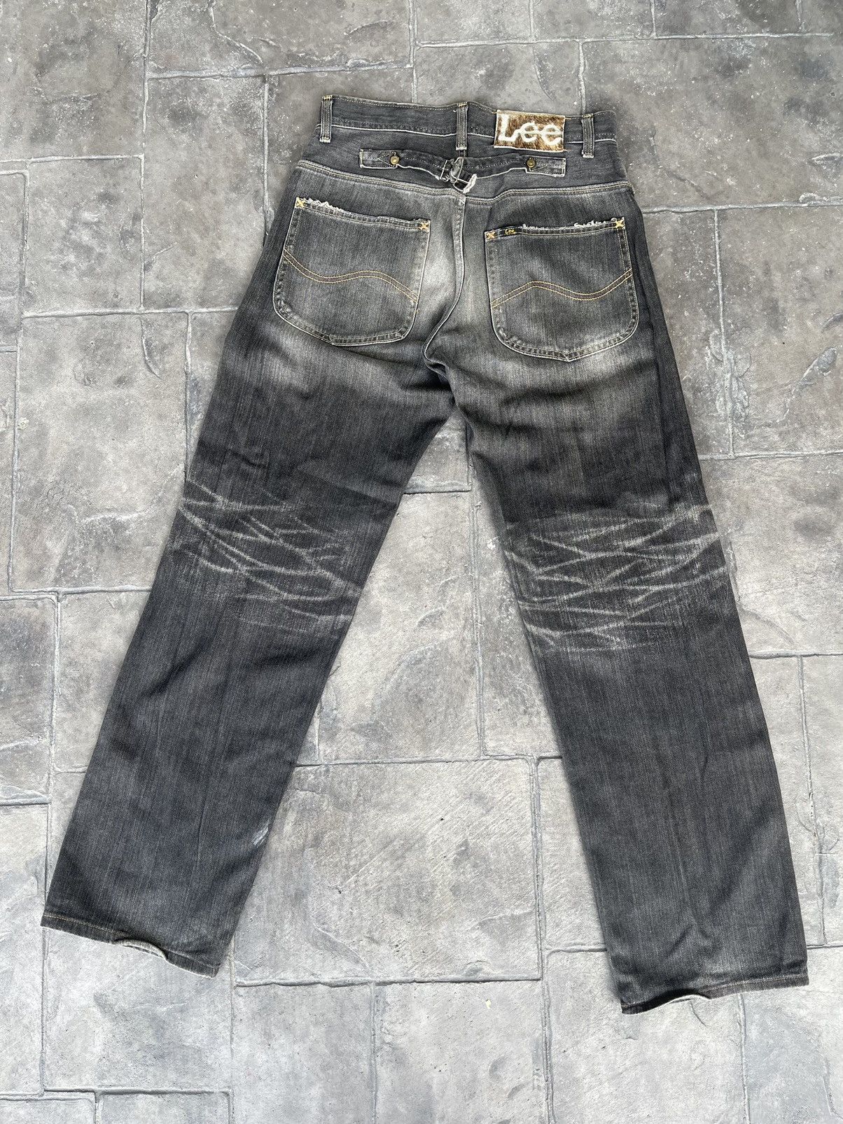 image of Japan Made Lee Buckle Back Distressed Denim in Black Distressed, Men's (Size 29)
