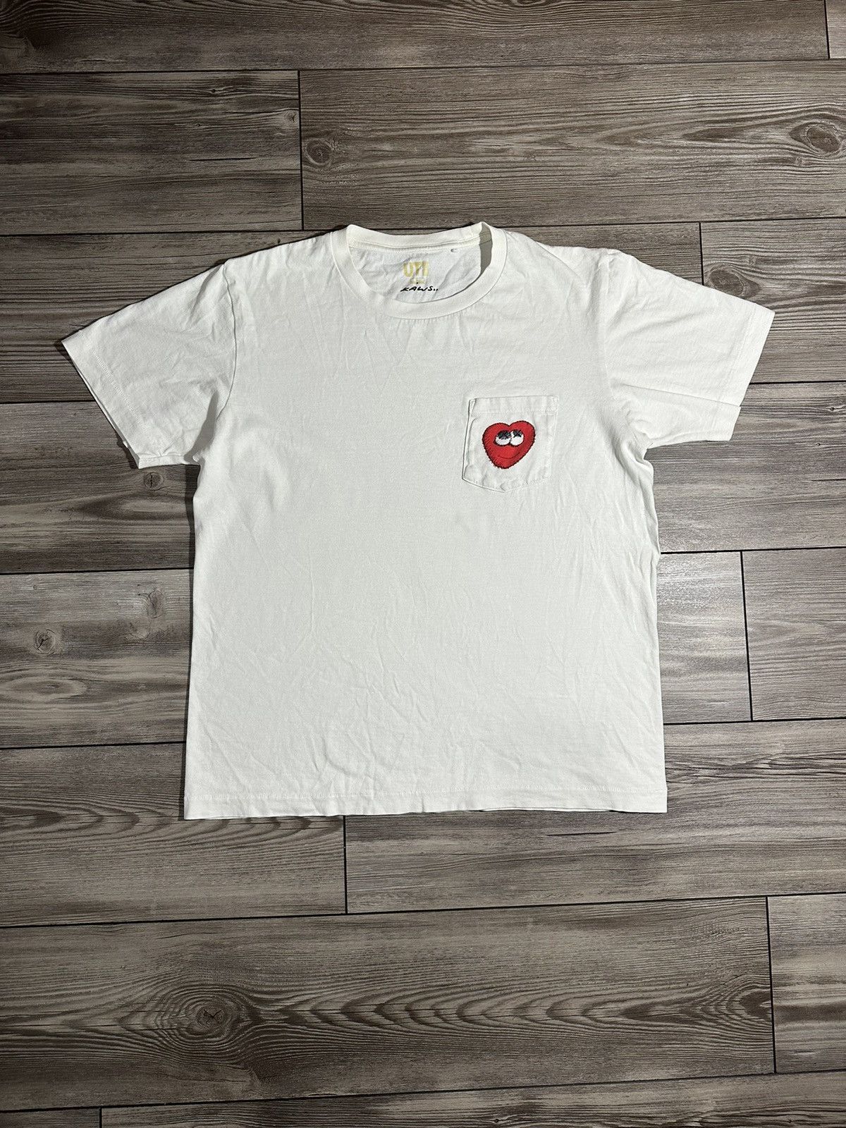 Uniqlo Kaws x Uniqlo Heart Pocket T Shirt | Grailed