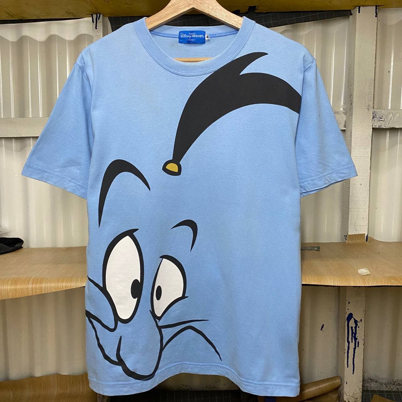 image of Aladdin Genie Disney Tee in Baby Blue, Men's (Size Medium)