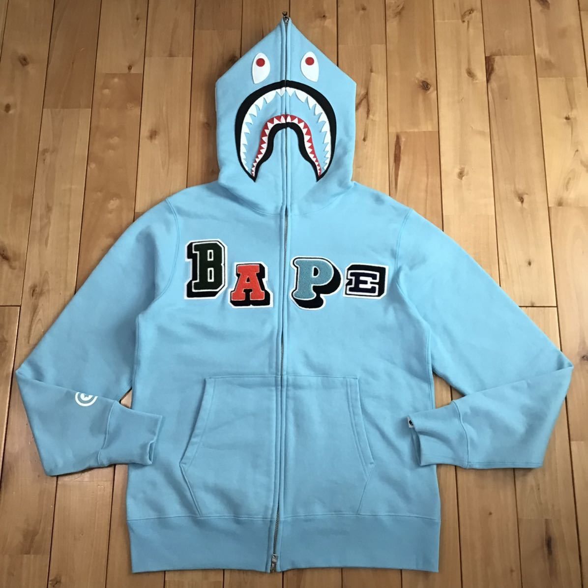 Bape BAPE logo multi fonts shark full zip hoodie light blue ape | Grailed