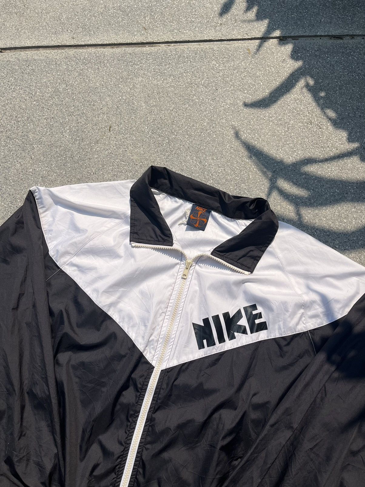 nike repeat pack polyknit logo taping cuffed joggers in white