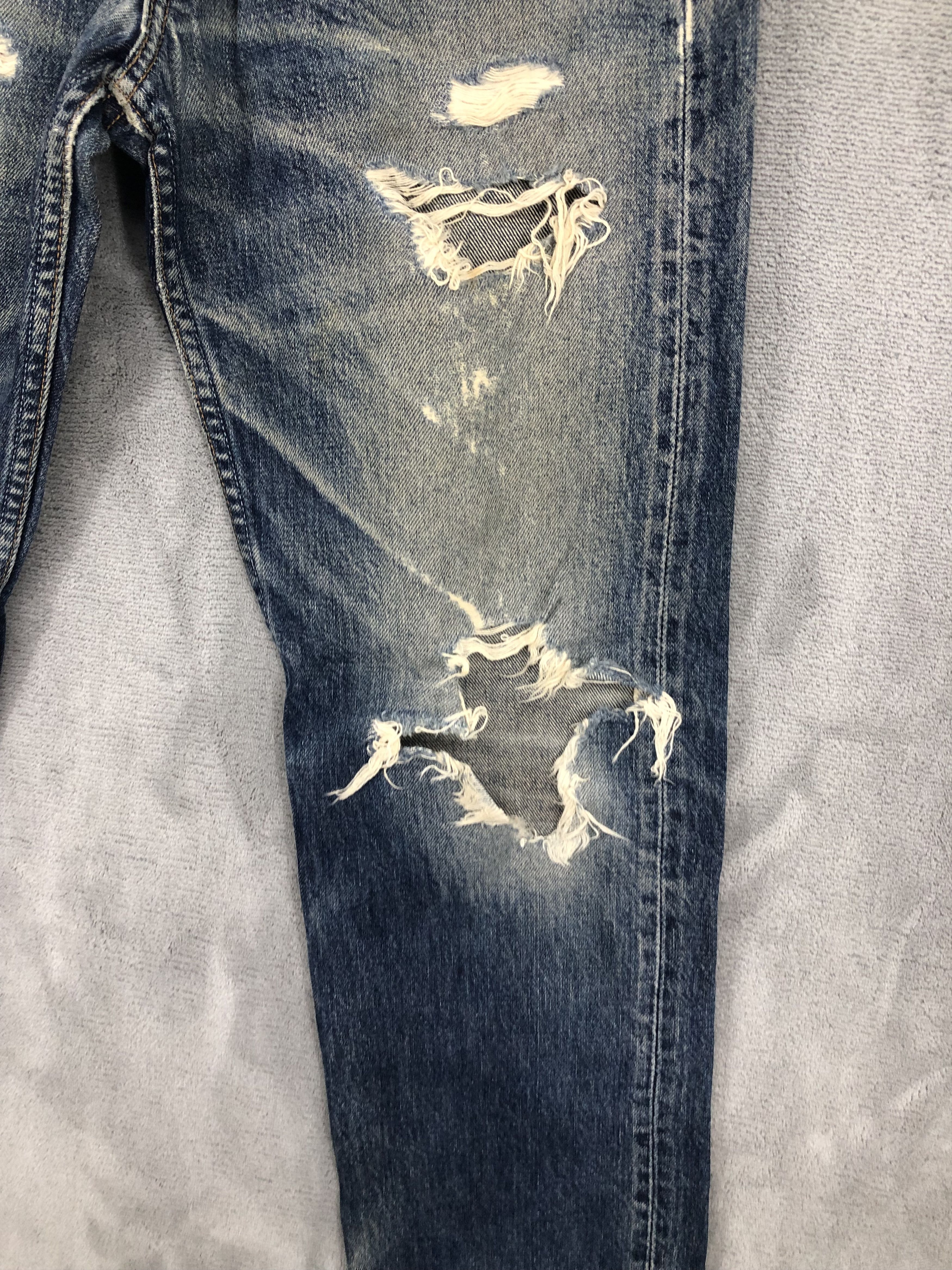 Vintage Levis 501 Distressed Denim Jeans