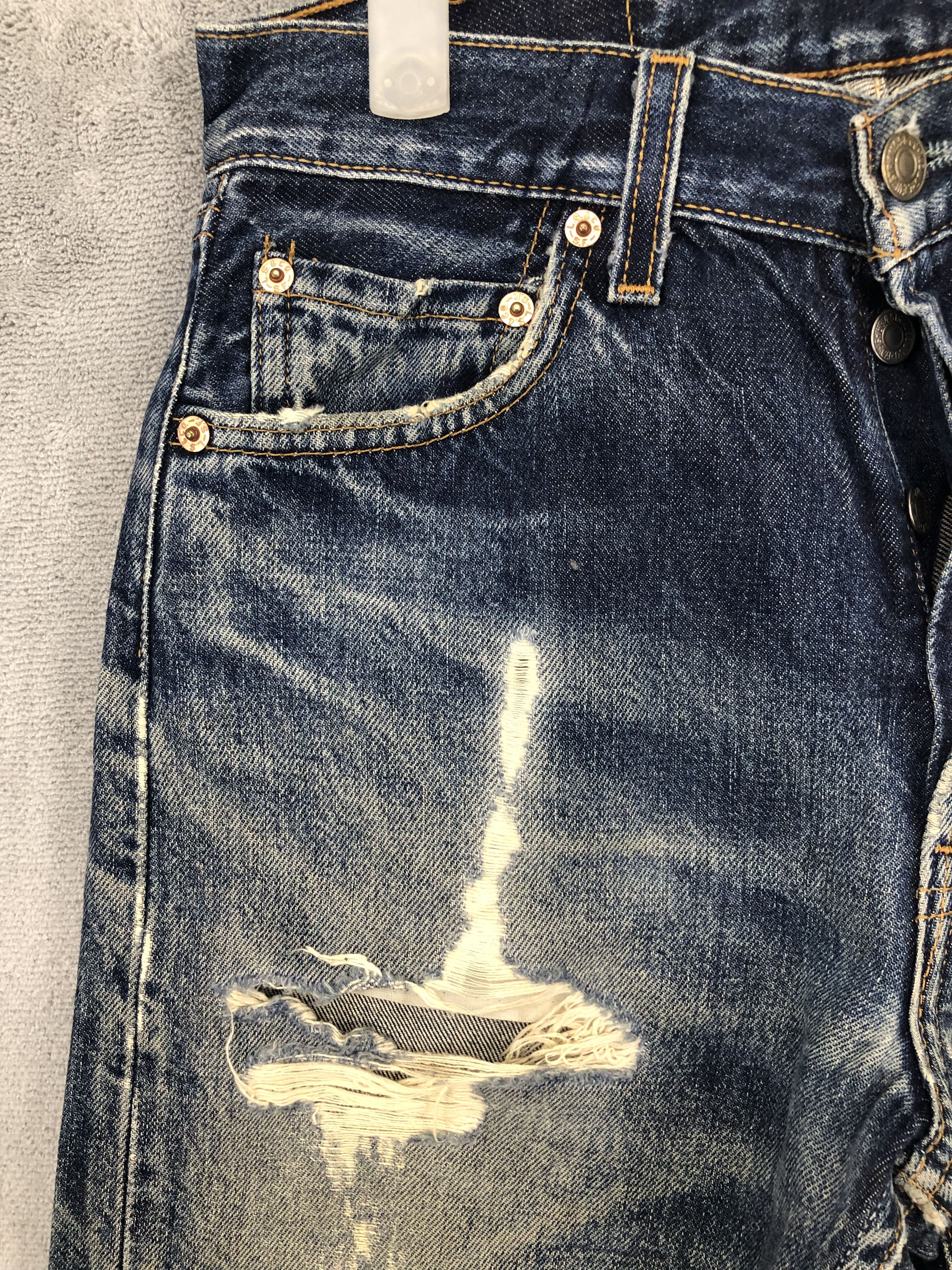 Vintage Levis 501 Distressed Denim Jeans