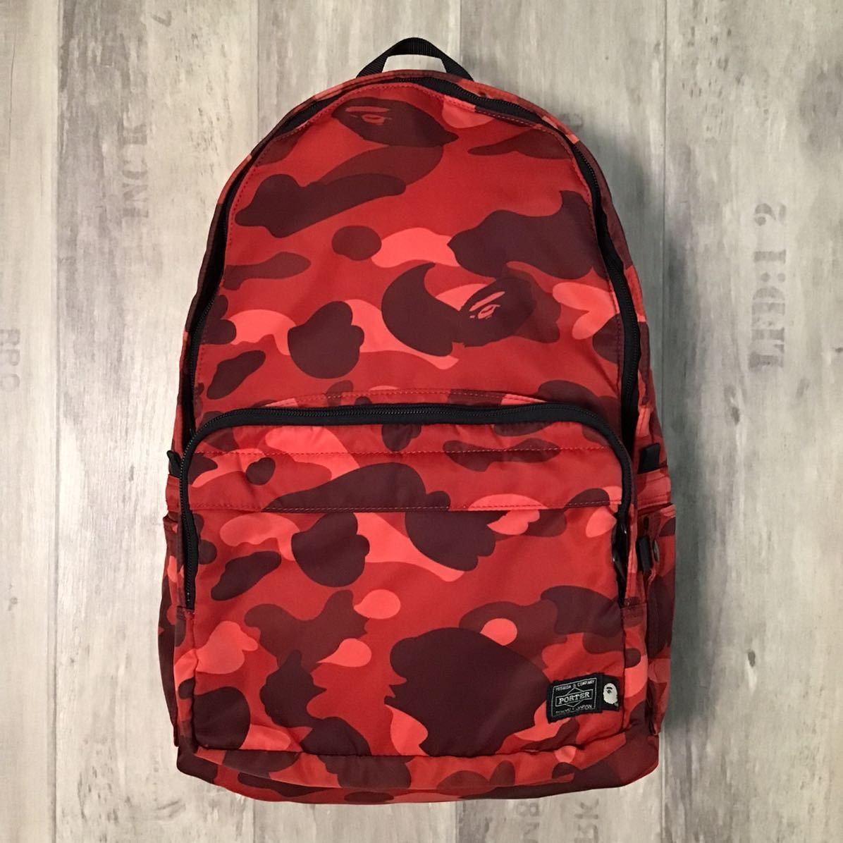 Bape BAPE × PORTER Red camo DAYPACK a bathing ape bag | Grailed