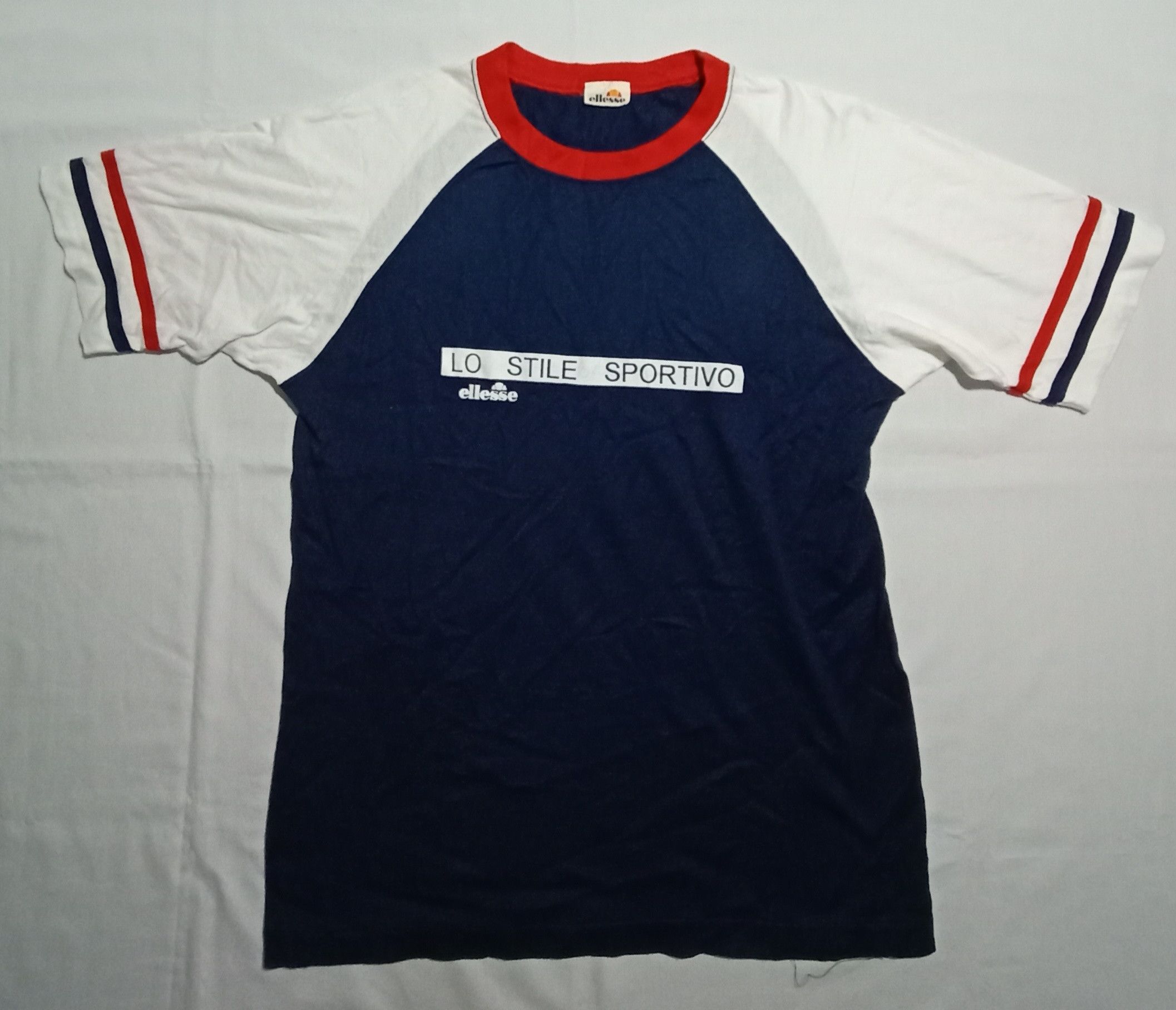 image of Ellesse Tee Spell Out Perugia Italia Dal 1959 in Blue Black, Men's (Size Small)