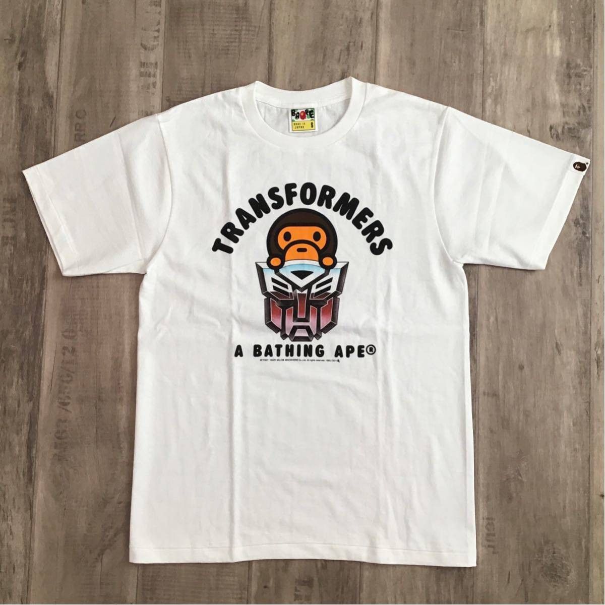 image of Bape × Transformers Baby Milo T-Shirt A Bathing Ape in White, Men's (Size Small)
