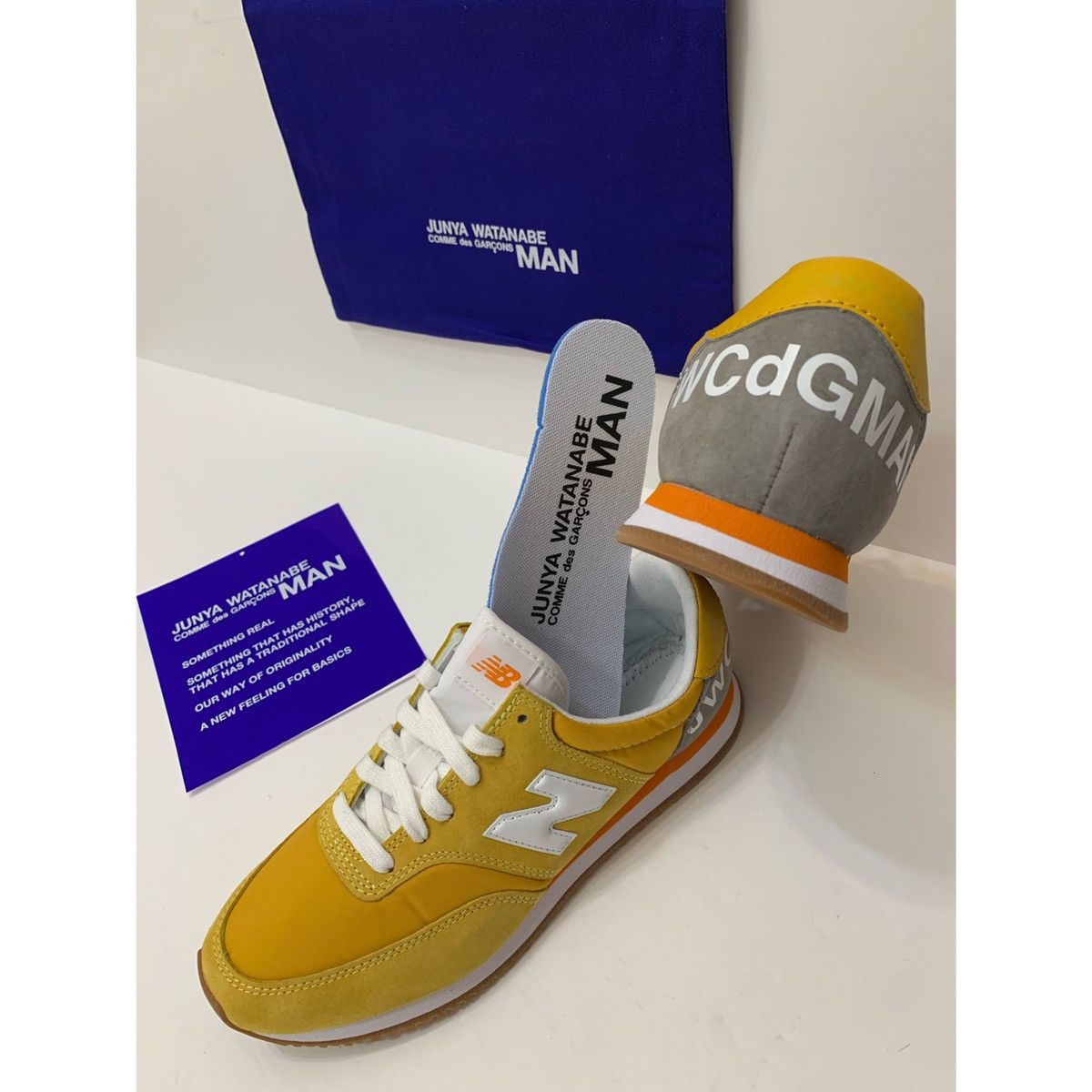 image of Comme Des Garcons x Junya Watanabe New Balance X Junya Watanabe Comp100 Sneaker in Mustard (Size 7)