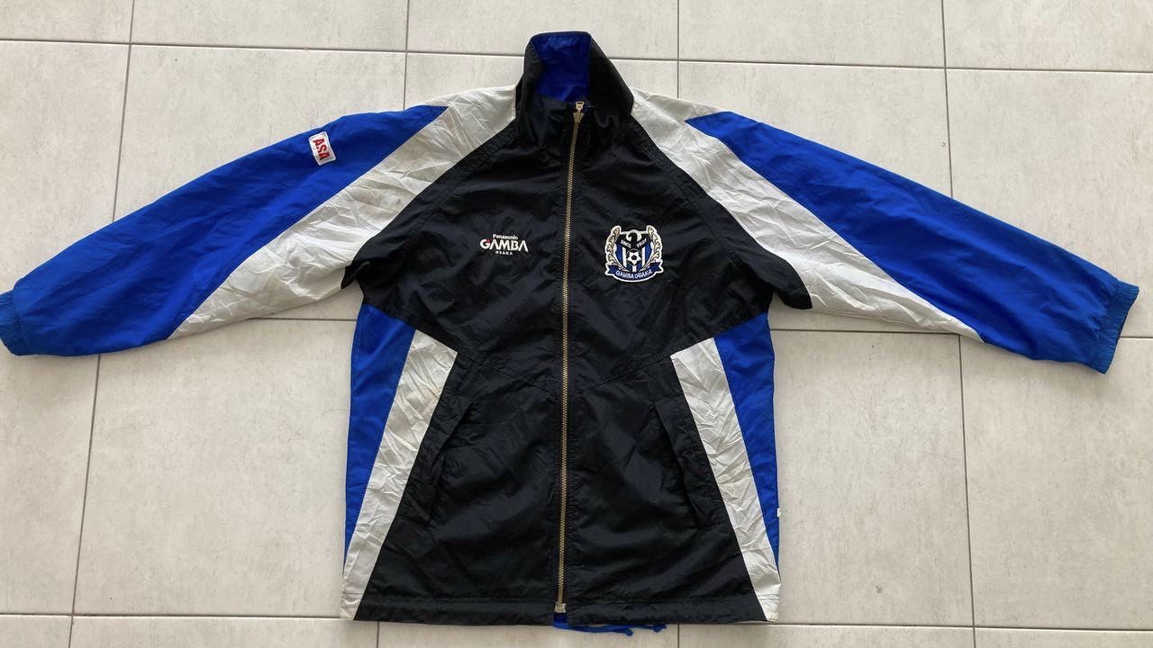 image of Vintage Panasonic Gamba Osaka Sweater in Blue/Black, Men's (Size Medium)
