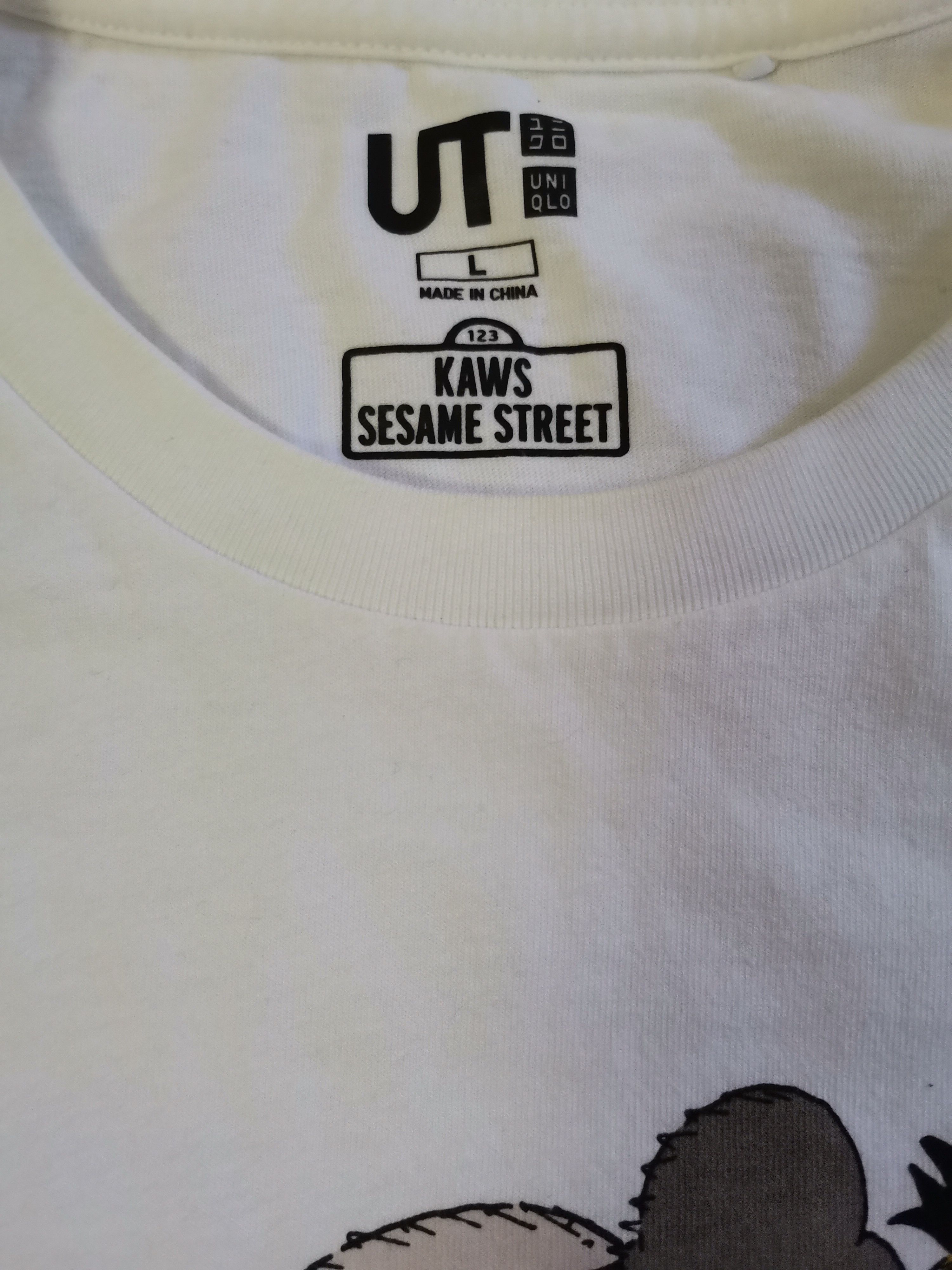 Kaws UT x Kaws Size US L / EU 52-54 / 3 - 5 Thumbnail
