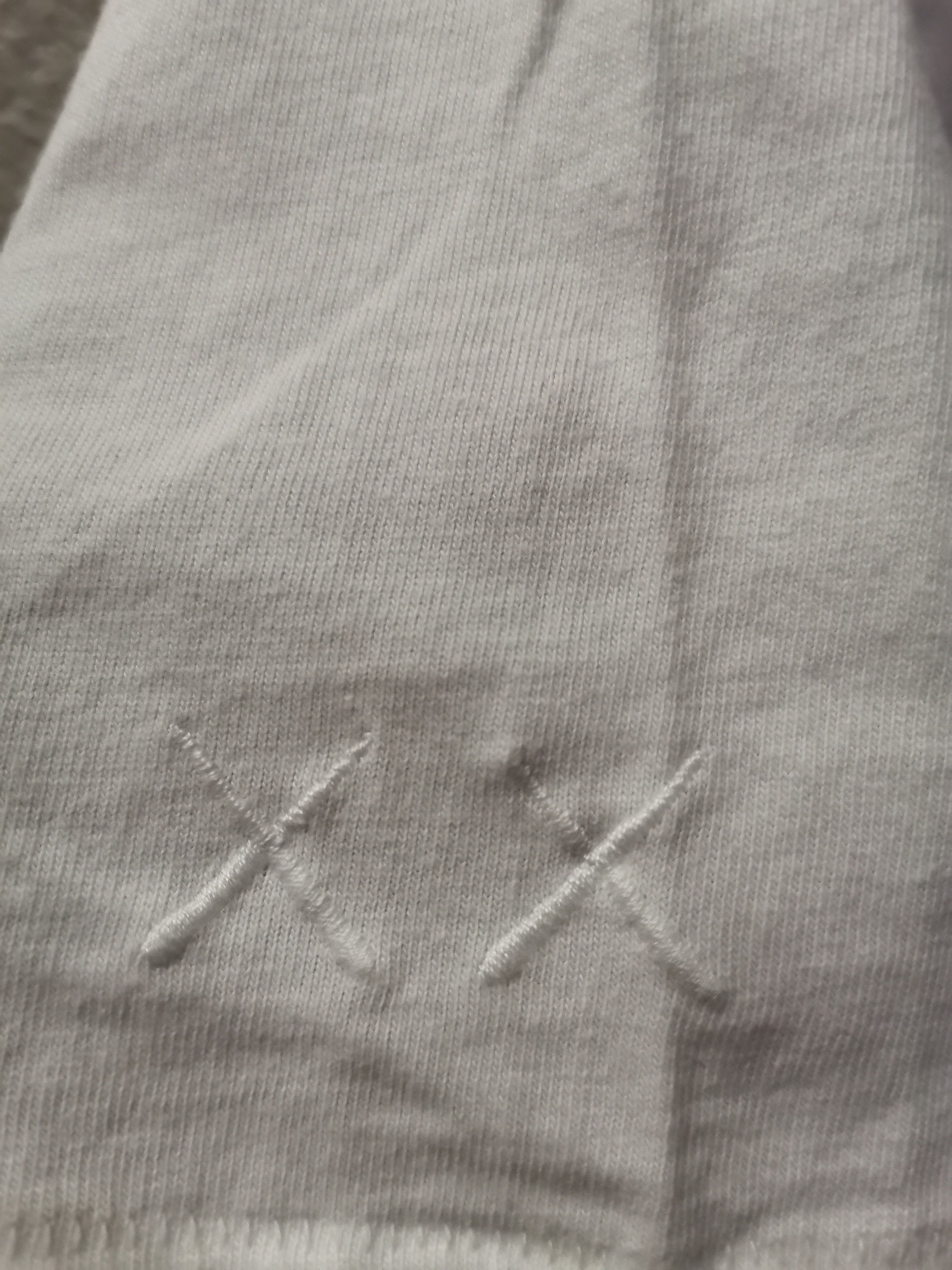 Kaws UT x Kaws Size US L / EU 52-54 / 3 - 4 Thumbnail