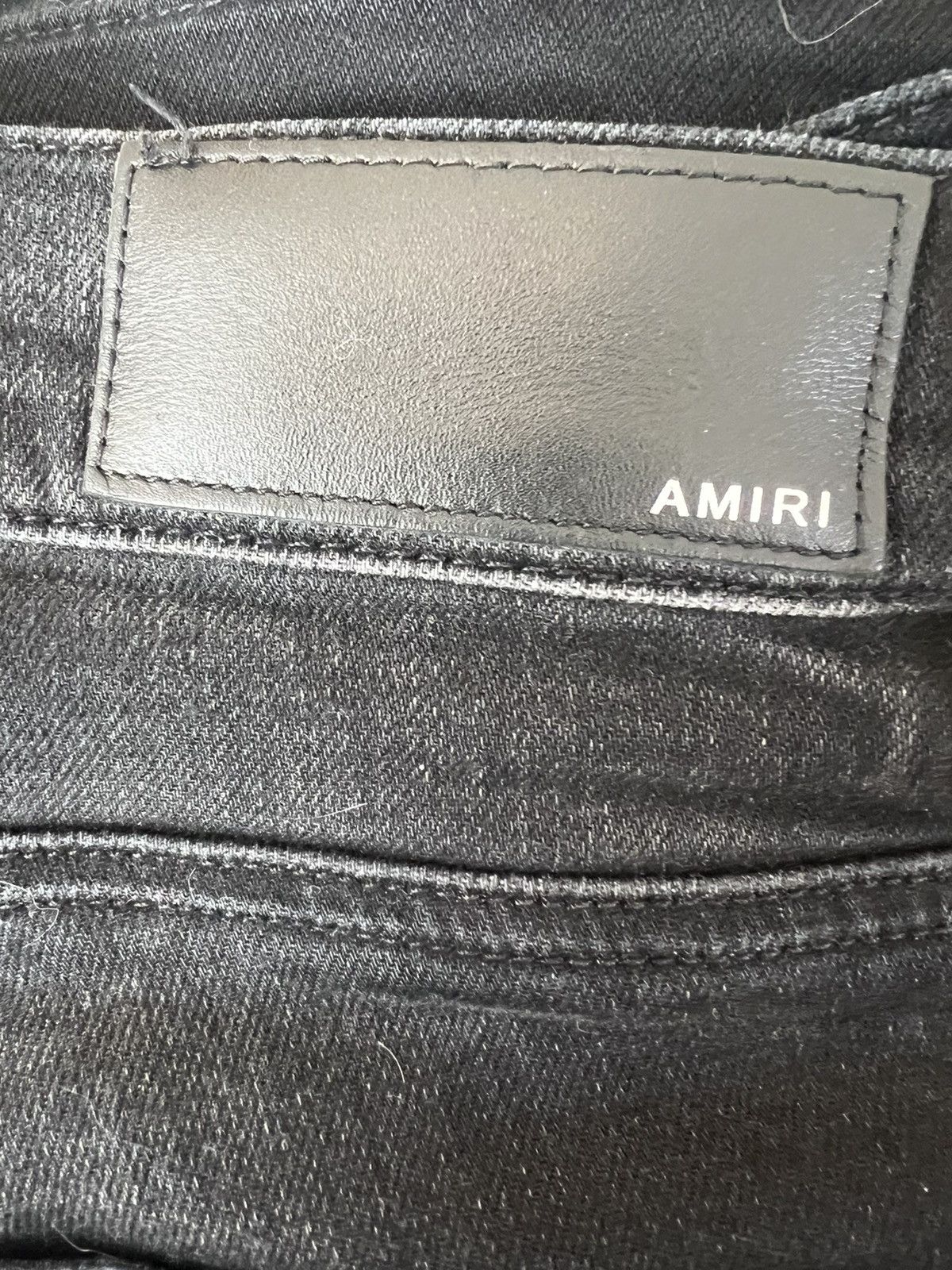 Amiri MX1 leather patch jeans