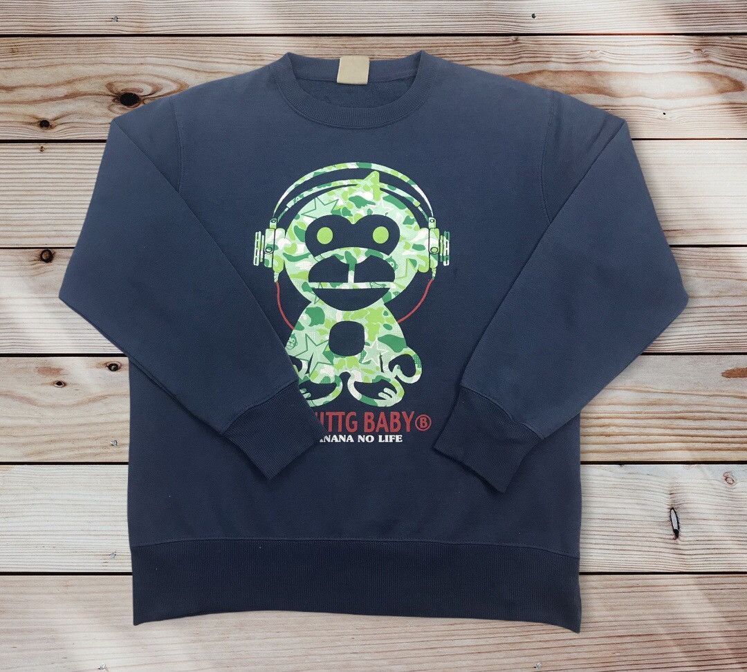 image of Uittg Baby Cartoon Spellout Logo Sweatshirt in Blue, Men's (Size Medium)