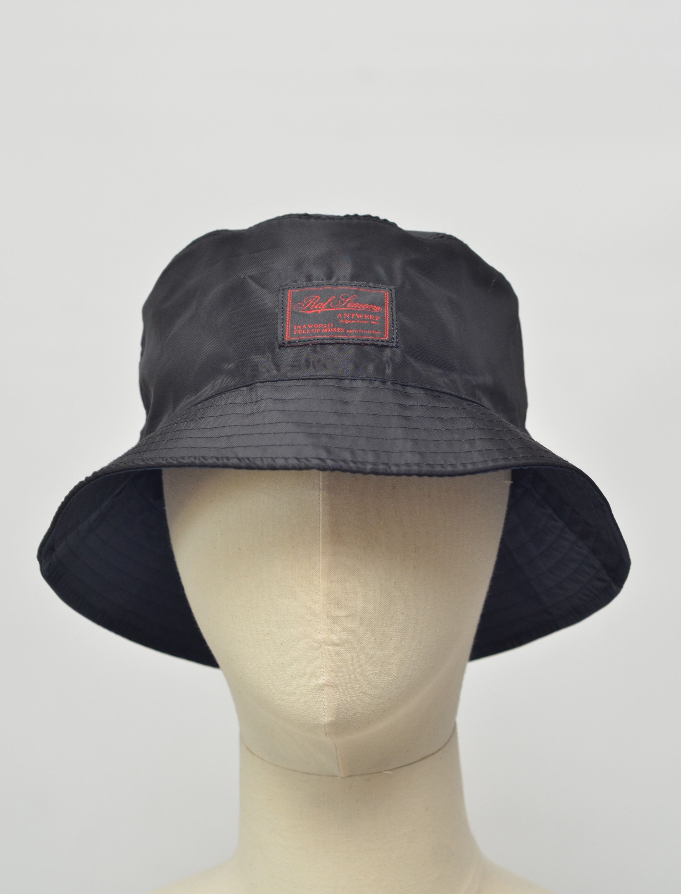 Reversible bucket hat in black - Raf Simons