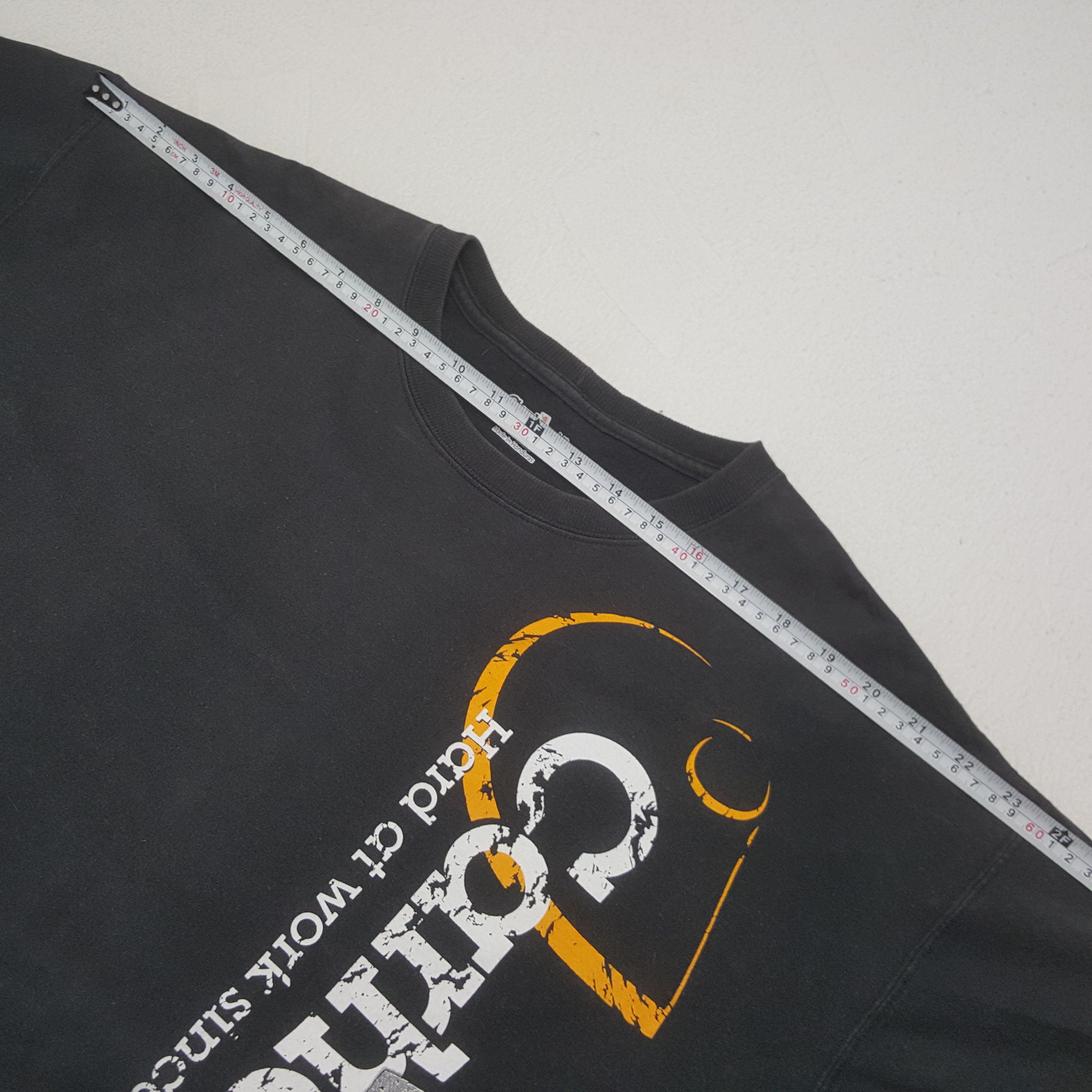 Vintage Carhartt Big Design Tshirt