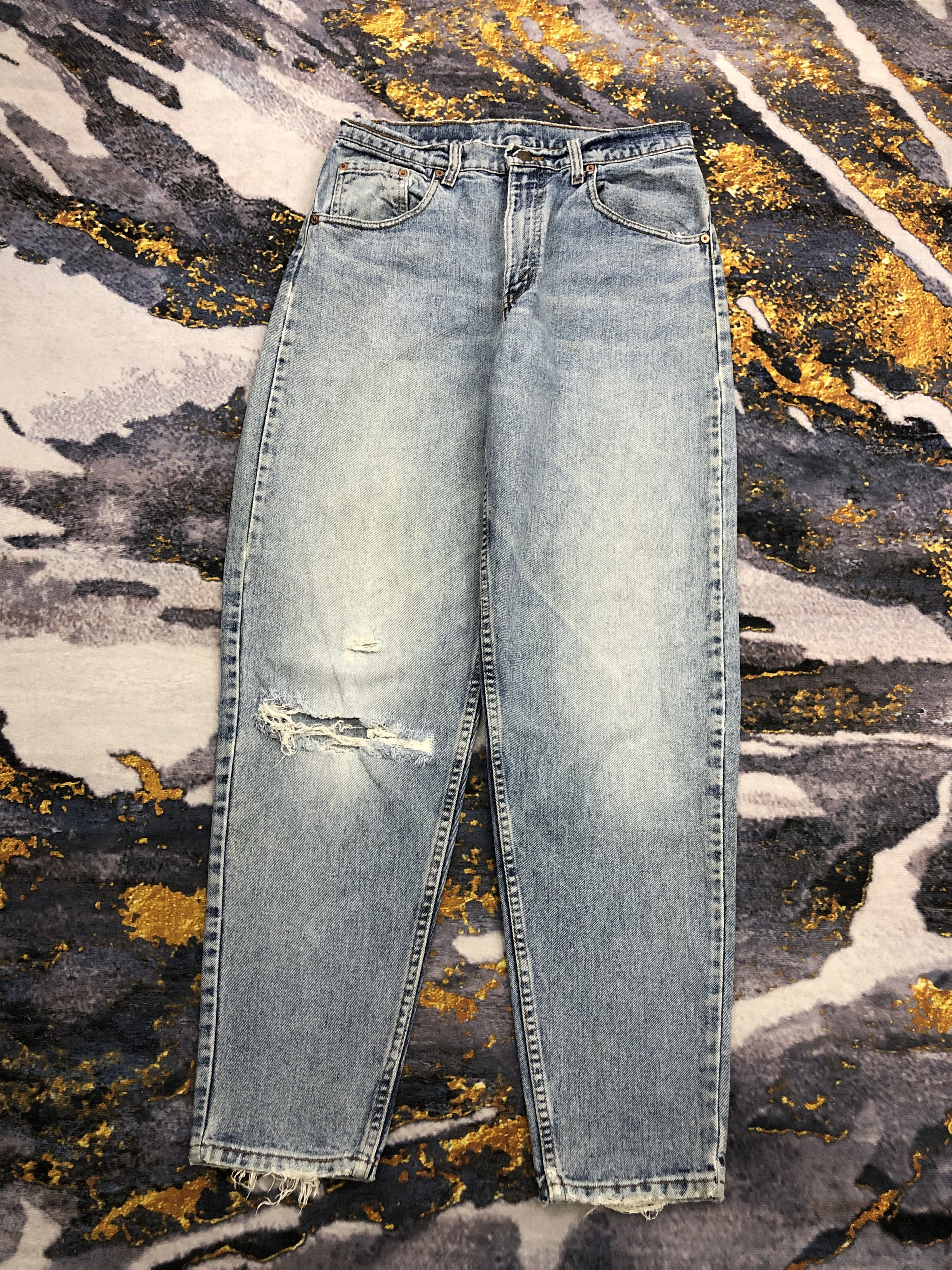 image of 90's Levis 560 Ripped Blue Denim Jeans, Men's (Size 32)