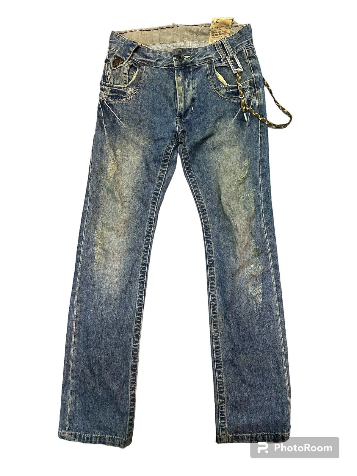 Distressed tough jeans mith