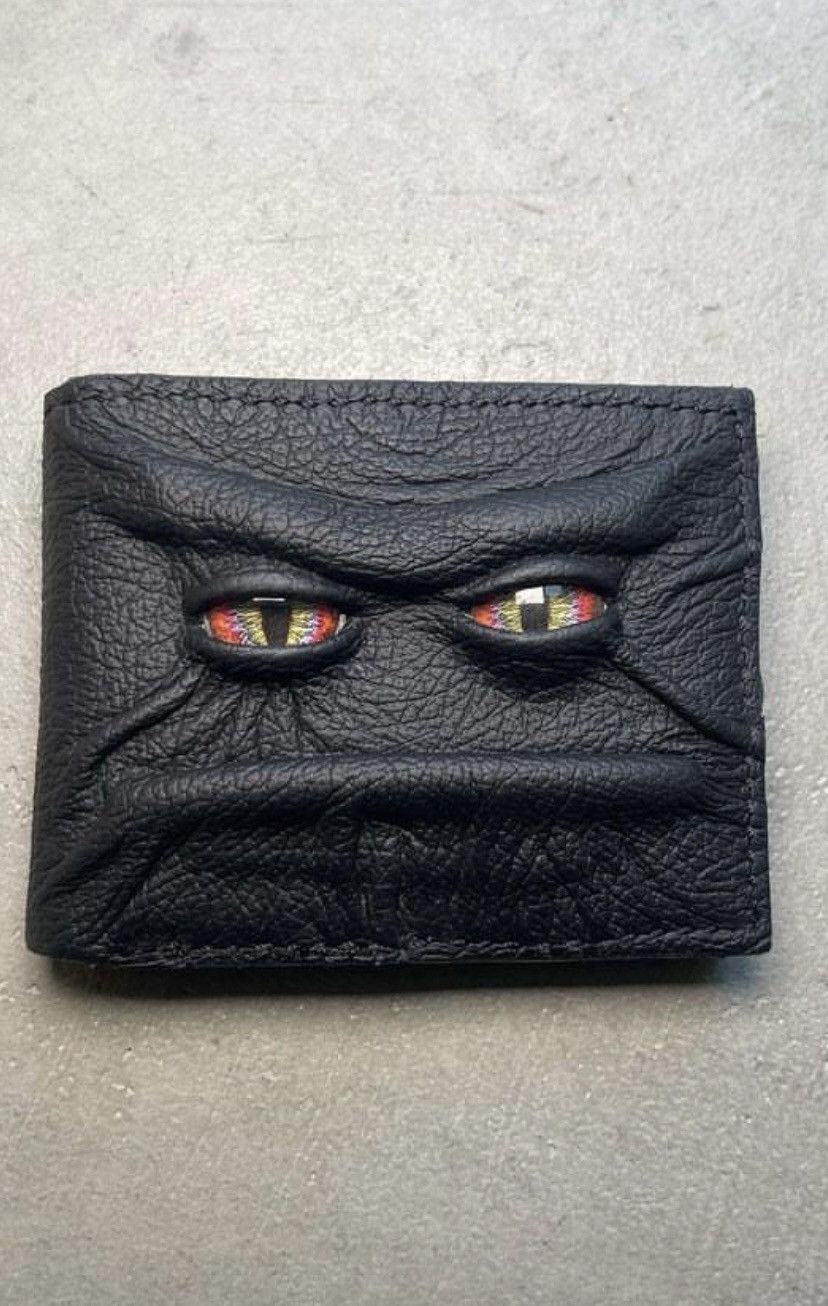 Reptilian wallet (red eyes)