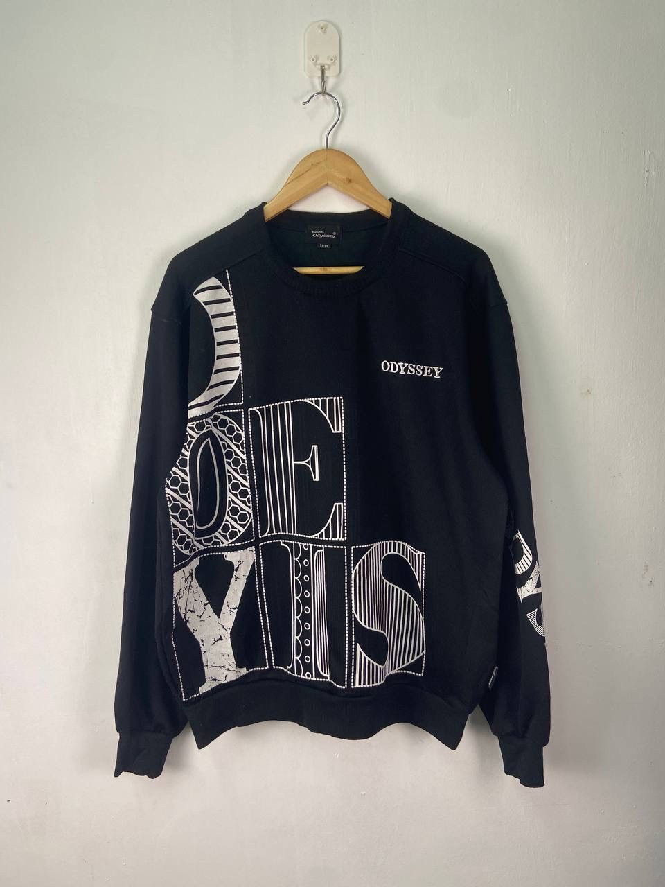 image of Vintage Eddie Odyssey Sweatshirt Big Logo Spellout in Black, Men's (Size Large)