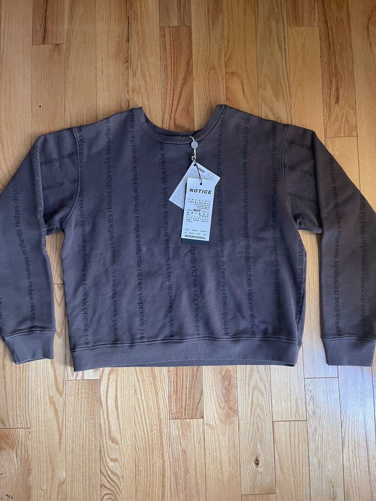 image of Enfants Riches Deprimes All Over Logo Crewneck in Brown, Men's (Size Large)