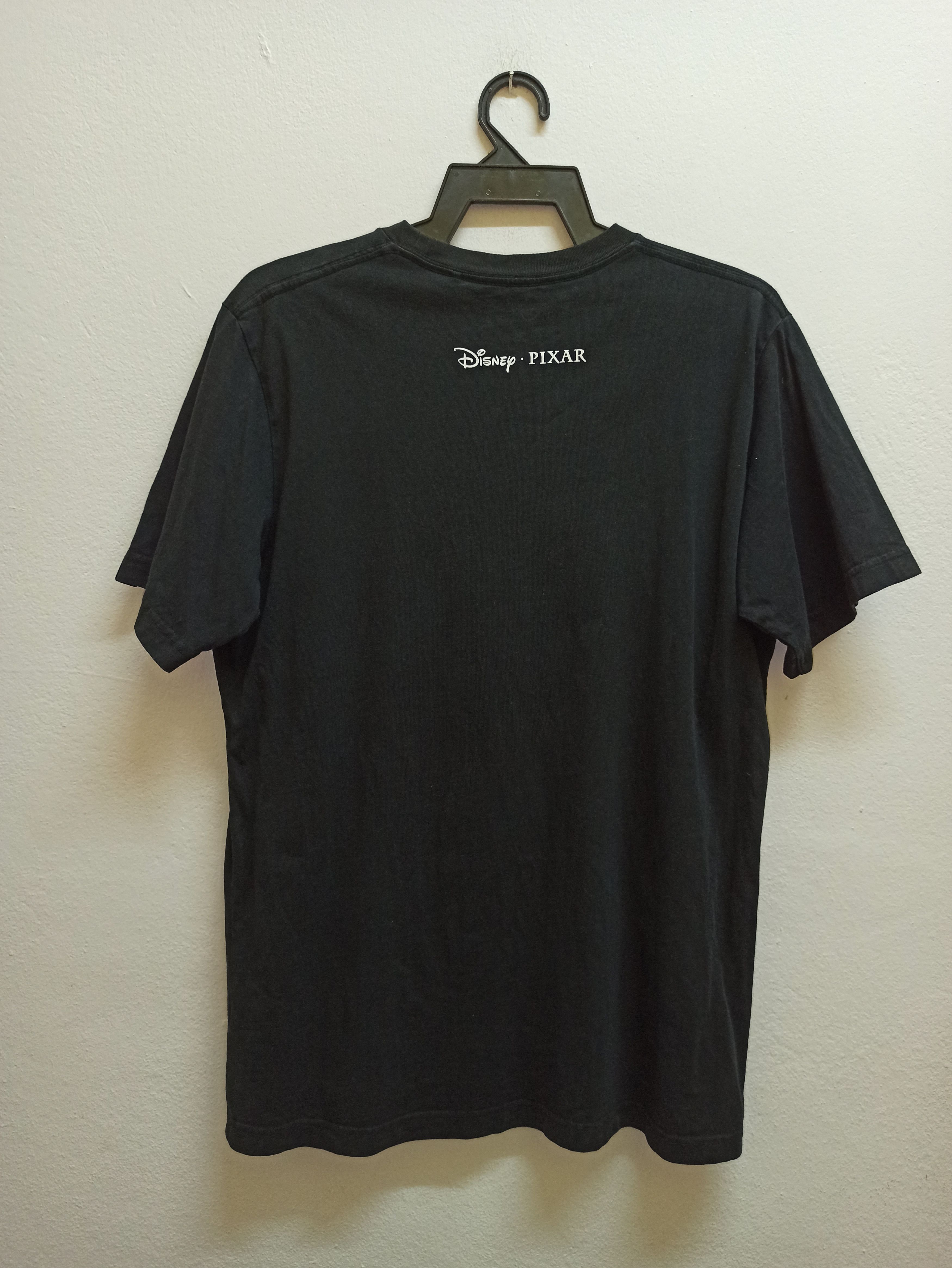 Disney Rare🔥 Black Pixar Animation Studios T-Shirt by Uniqlo(c34) Size US XL / EU 56 / 4 - 5 Thumbnail