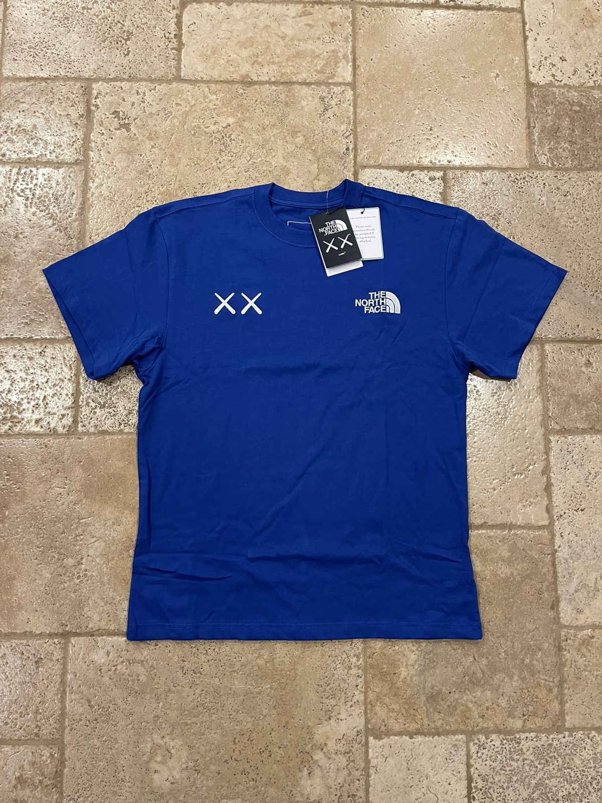 The North Face KAWS x The North Face Short Sleeve Blue Tee | Grailed