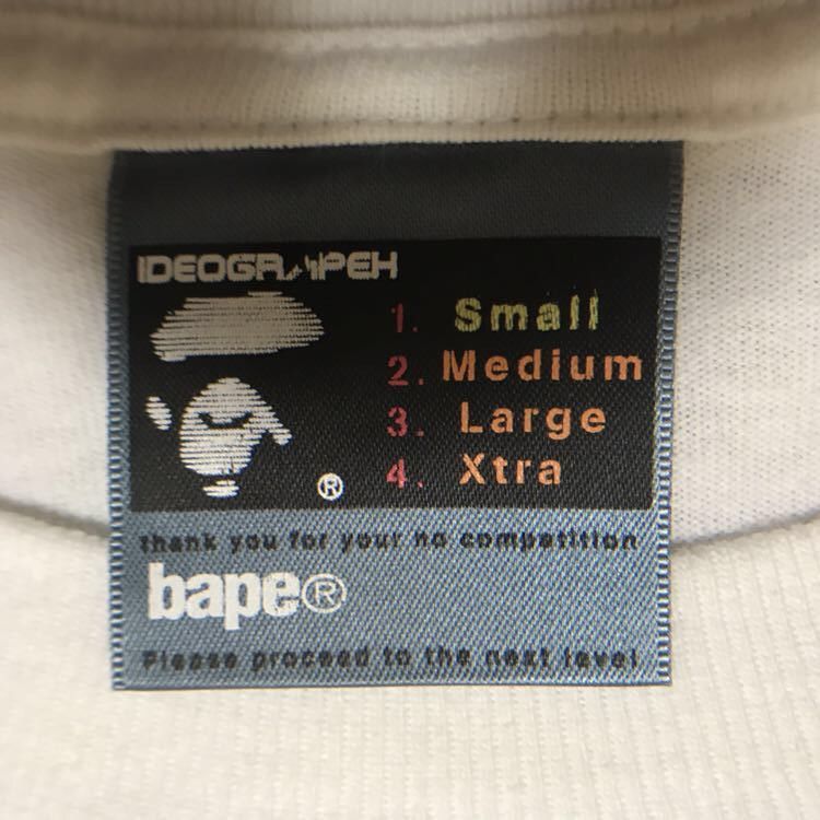Bape × Kaws KAWS × BAPE Michelin Man chum T-shirt a bathing ape NIGO Size US S / EU 44-46 / 1 - 6 Thumbnail