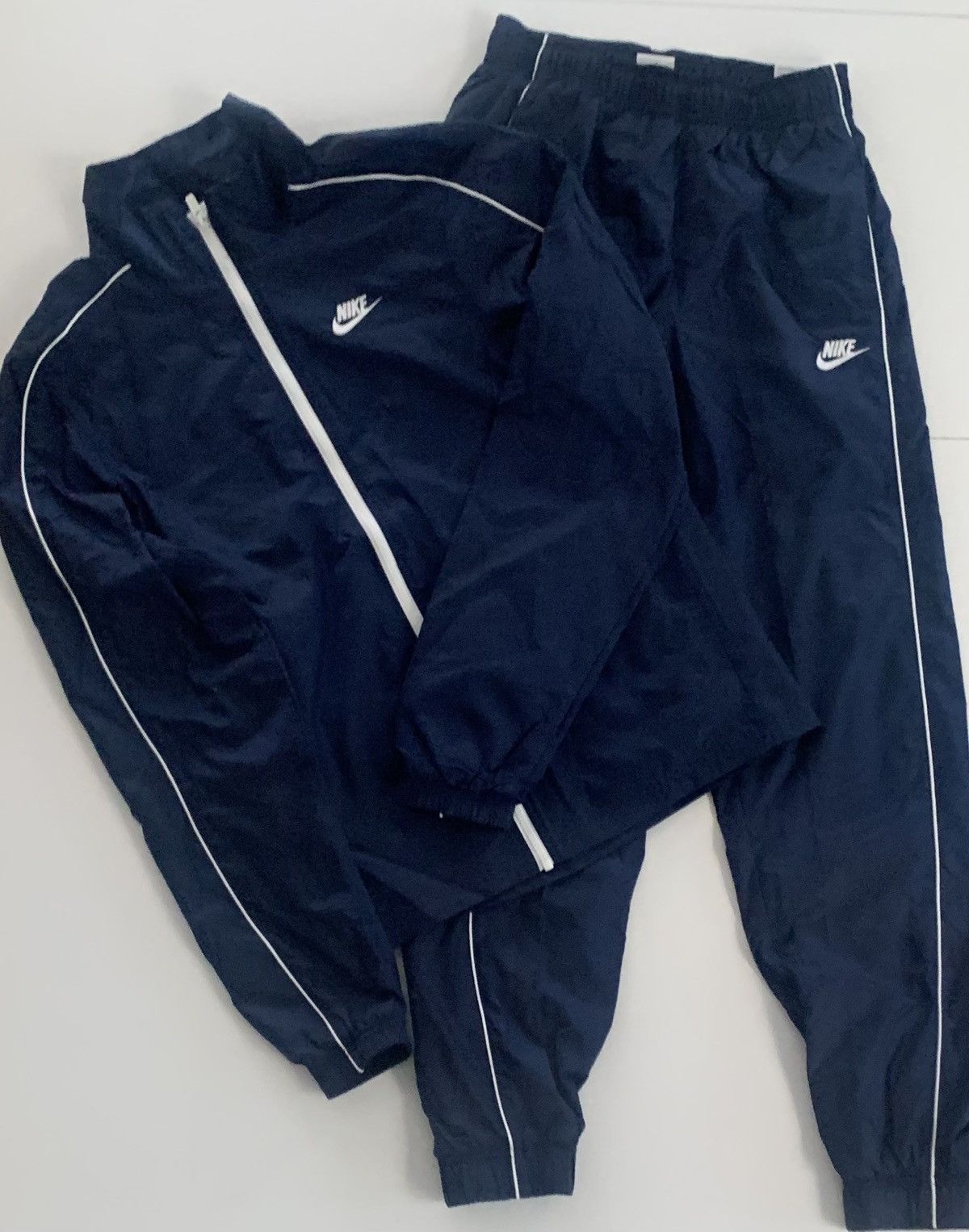 Navy blue nike jogging suit deals