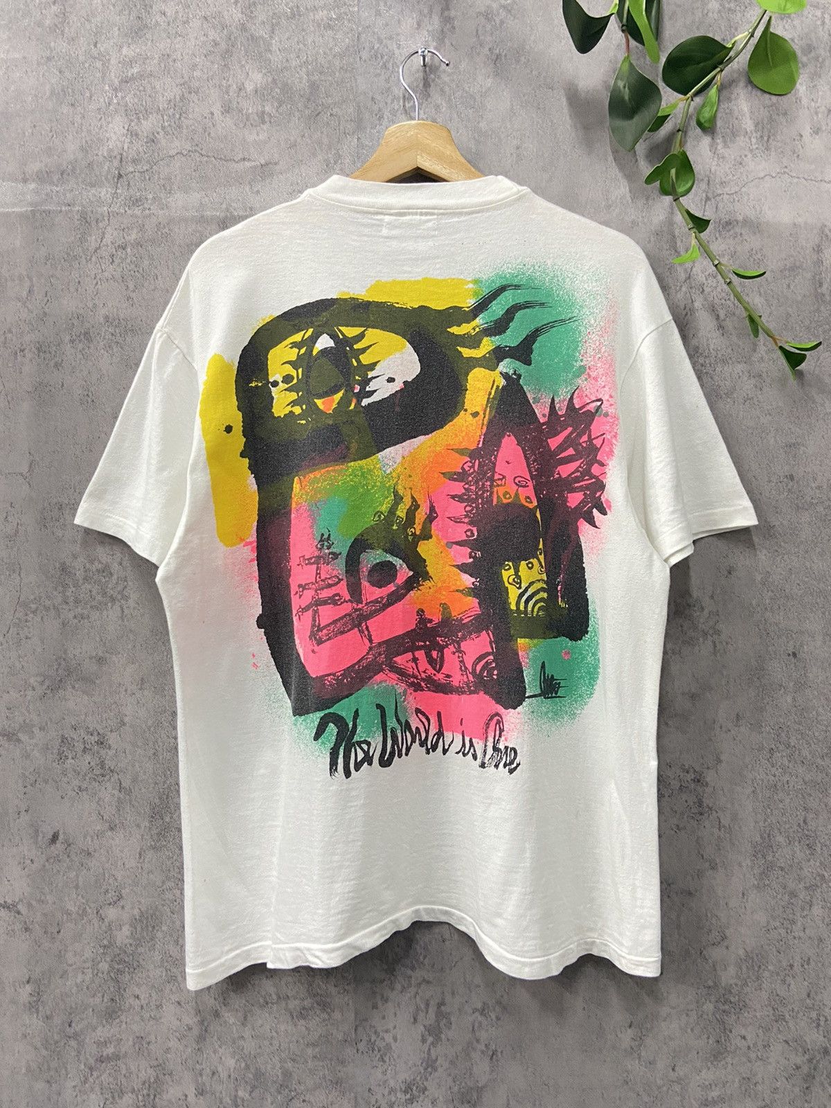 image of 90’S Pop Art Eye The World Is Lie Illustration Tee in White, Men's (Size Large)