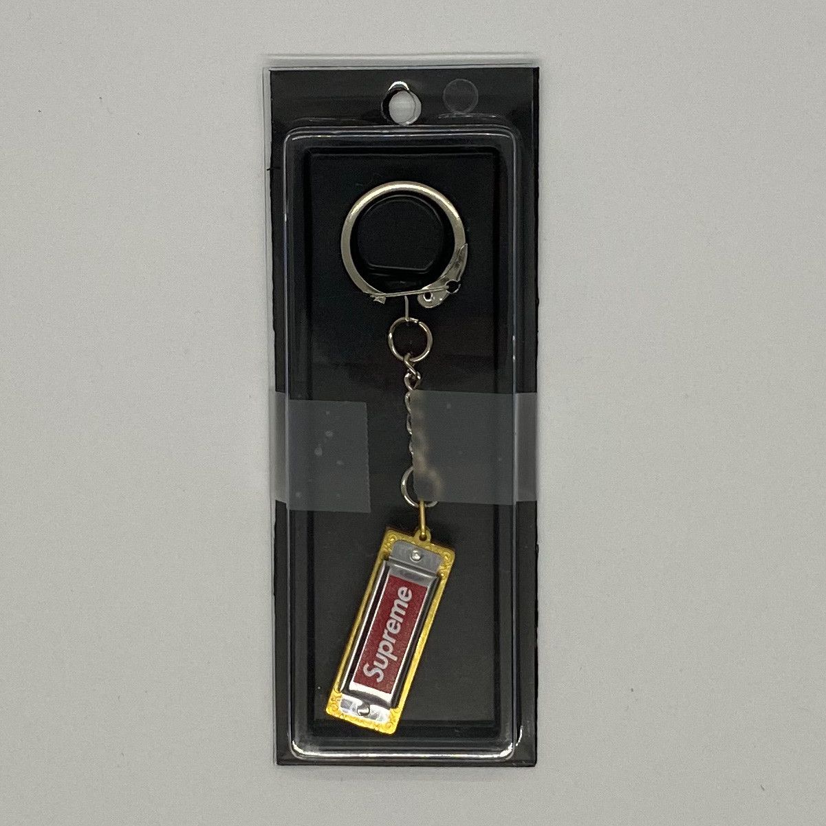 image of Supreme X Hohner Keychain in Silver, Men's