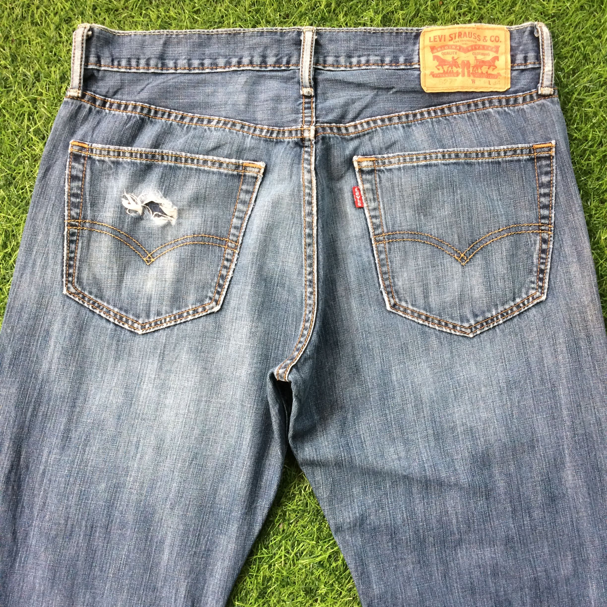 Levi's × Vintage Levi's 527 Ripped Bootcut Jeans #B-562 Size US 33 - 4 Thumbnail