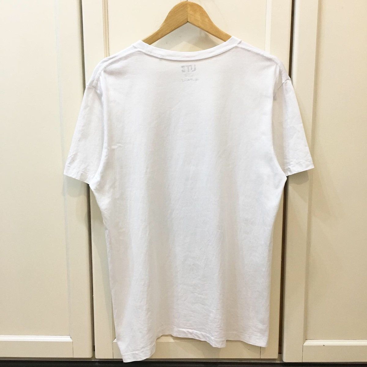 Japanese Brand Kaws x Uniqlo OG Logo Tee Size US L / EU 52-54 / 3 - 6 Thumbnail