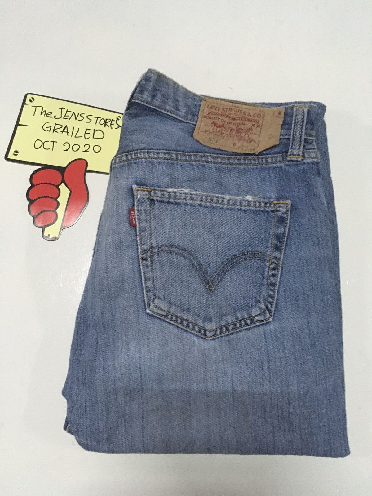 Vintage Levi's 501 distressed blue wash denim