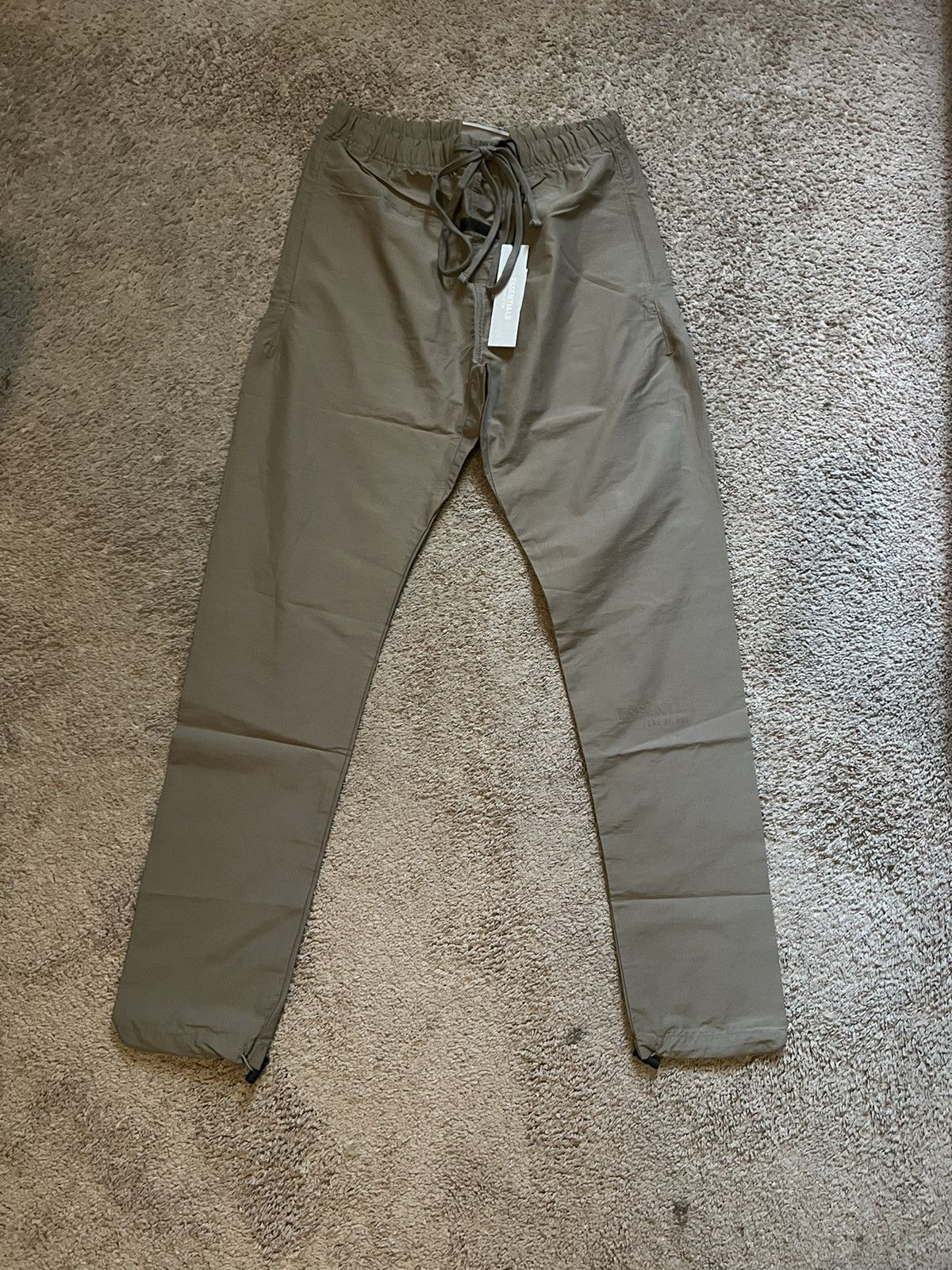 image of Fear Of God Essentials Track Pant Harvest Xs in Harvest Goldrinse, Men's (Size 28)