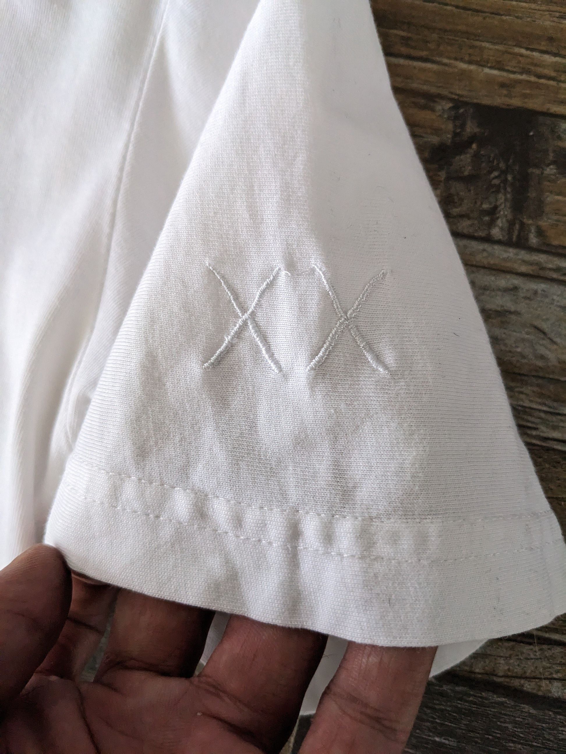 Japanese Brand × Kaws Kaws x Uniqlo Clean Slate Tee Size US S / EU 44-46 / 1 - 6 Thumbnail