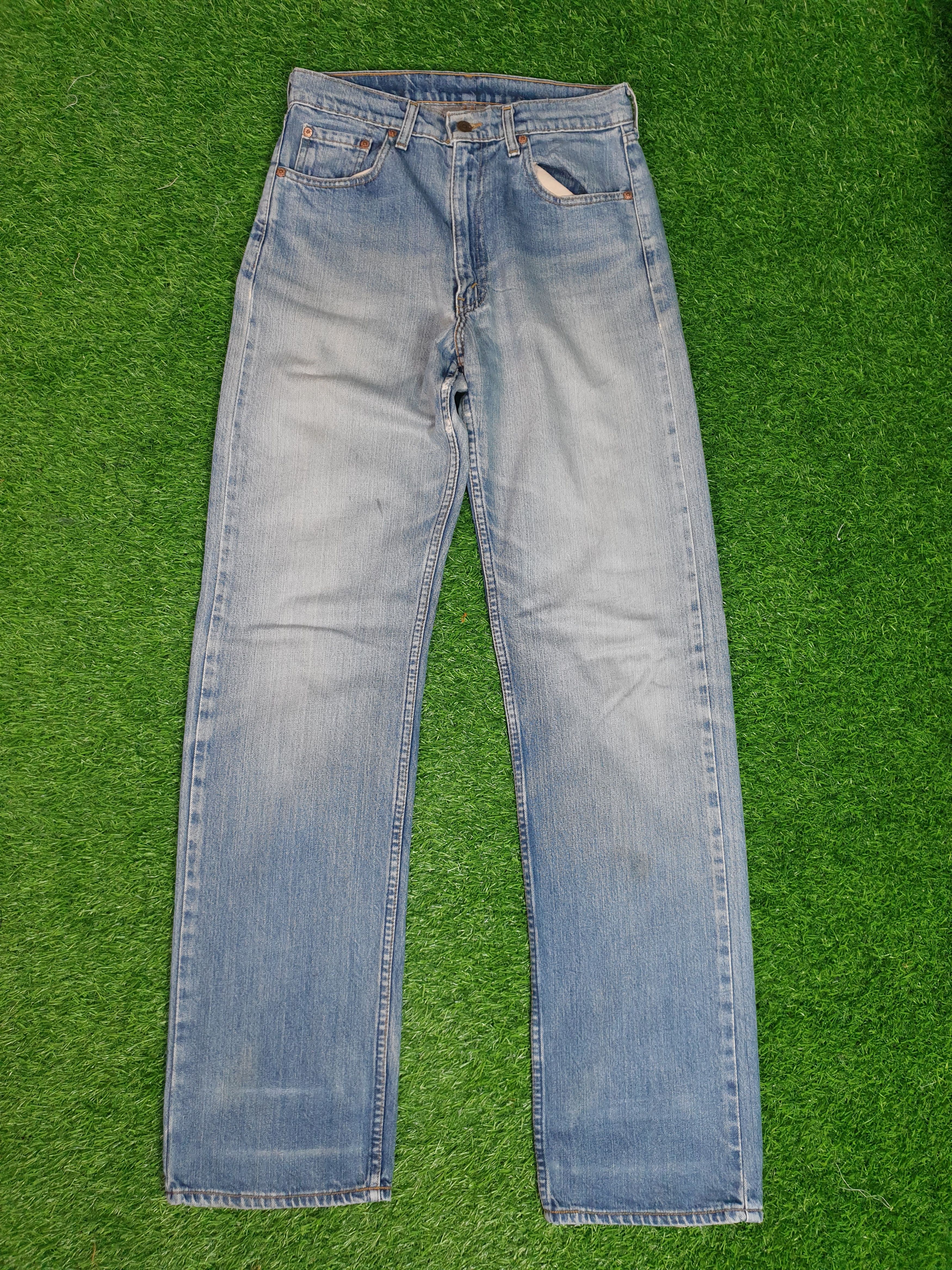 Vintage LEVIS 512 Light Wash Faded Size 30X34.5 Jeans L0161