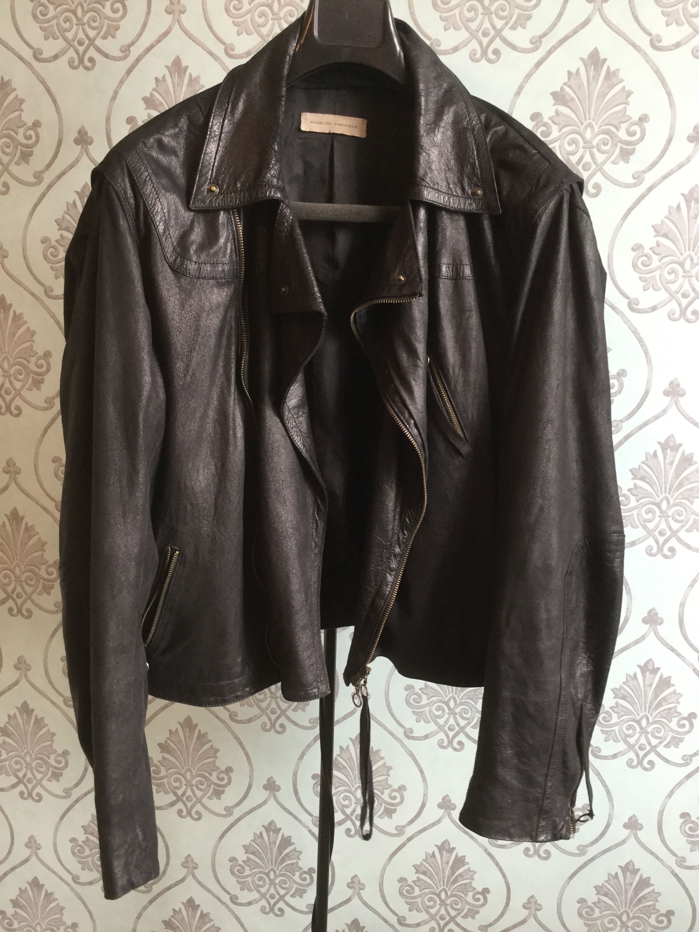 Black leather jacket. Like Vetements or Damir Doma jackets